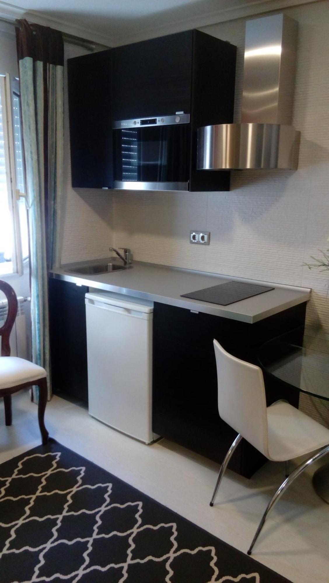 Estudio con 2 camas individuales
