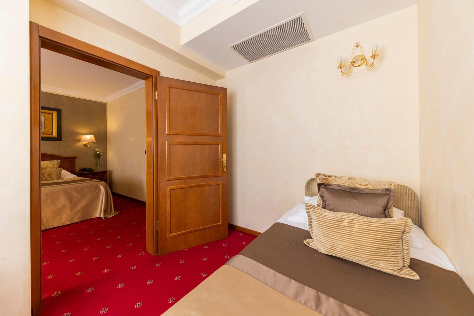 Chambre Triple avec Balcon