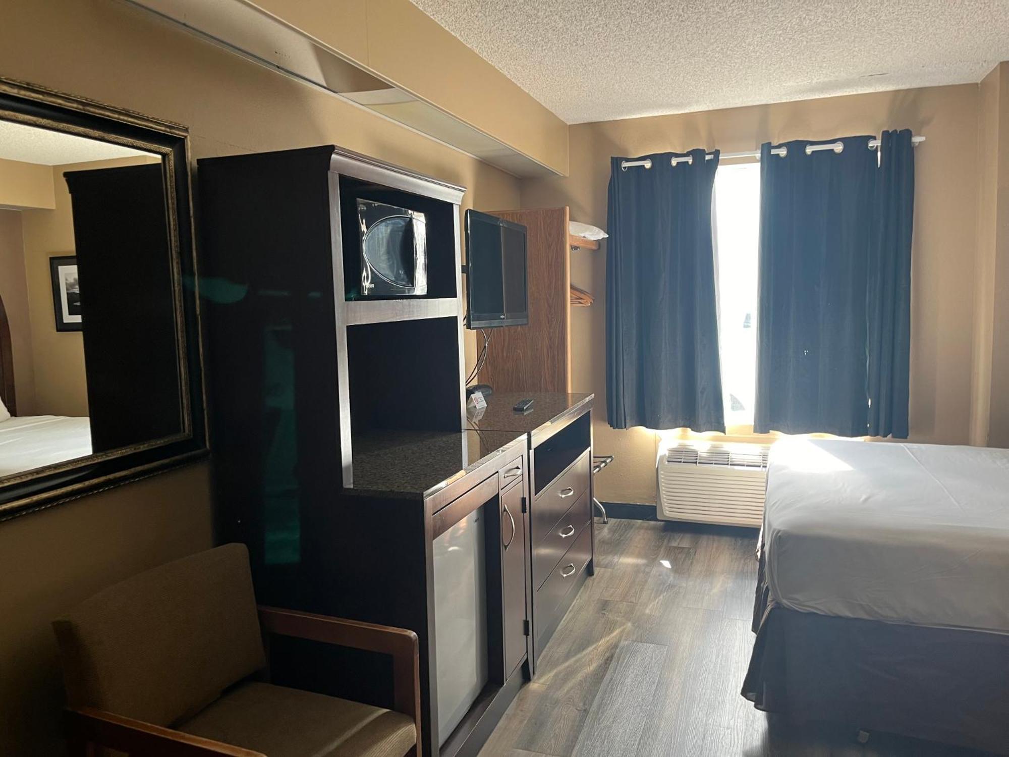 One Queen Bed Swift Current Suite Non-Smoking