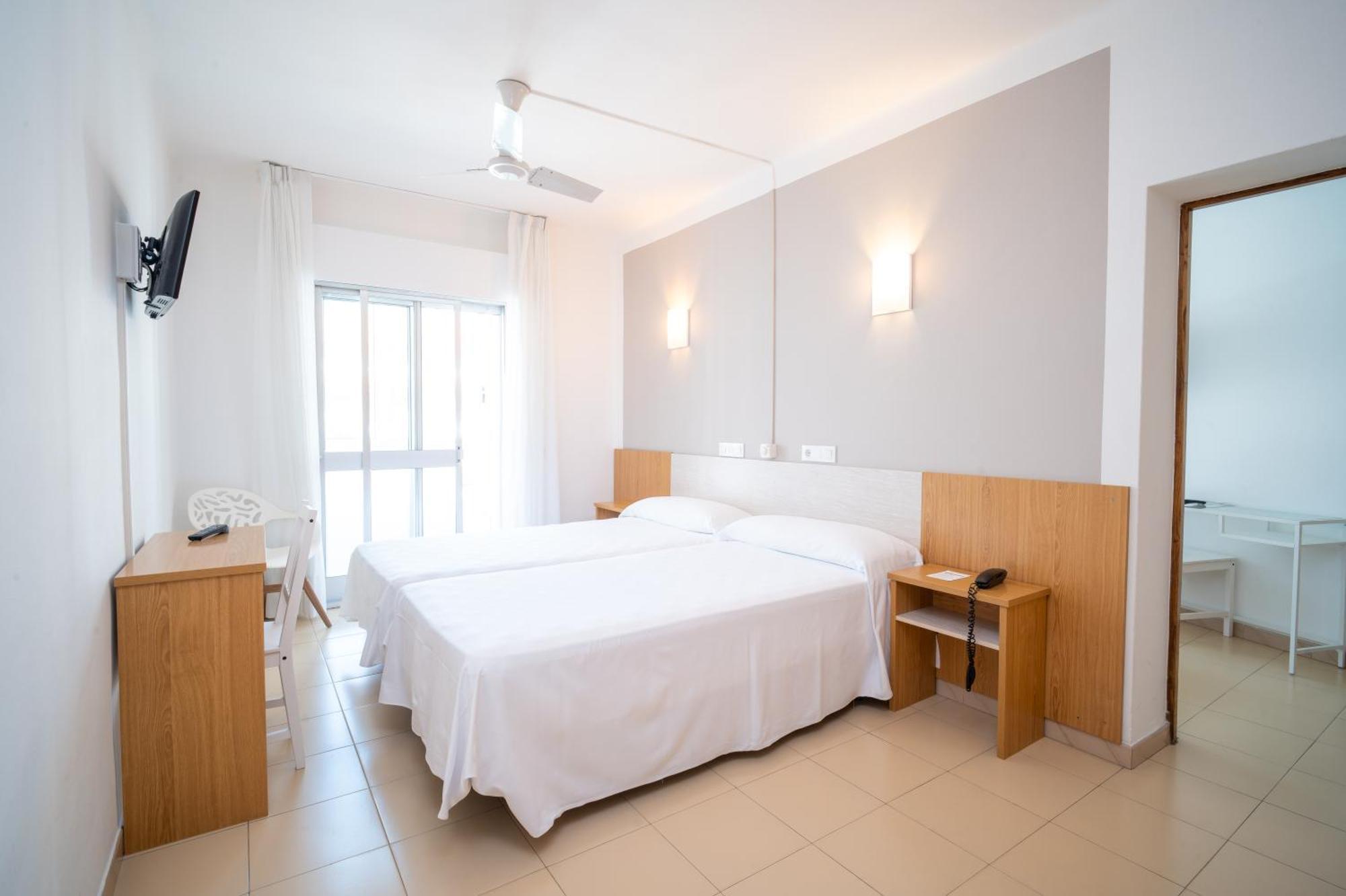 Quarto Familiar (2 Adultos + 2 Crianças)