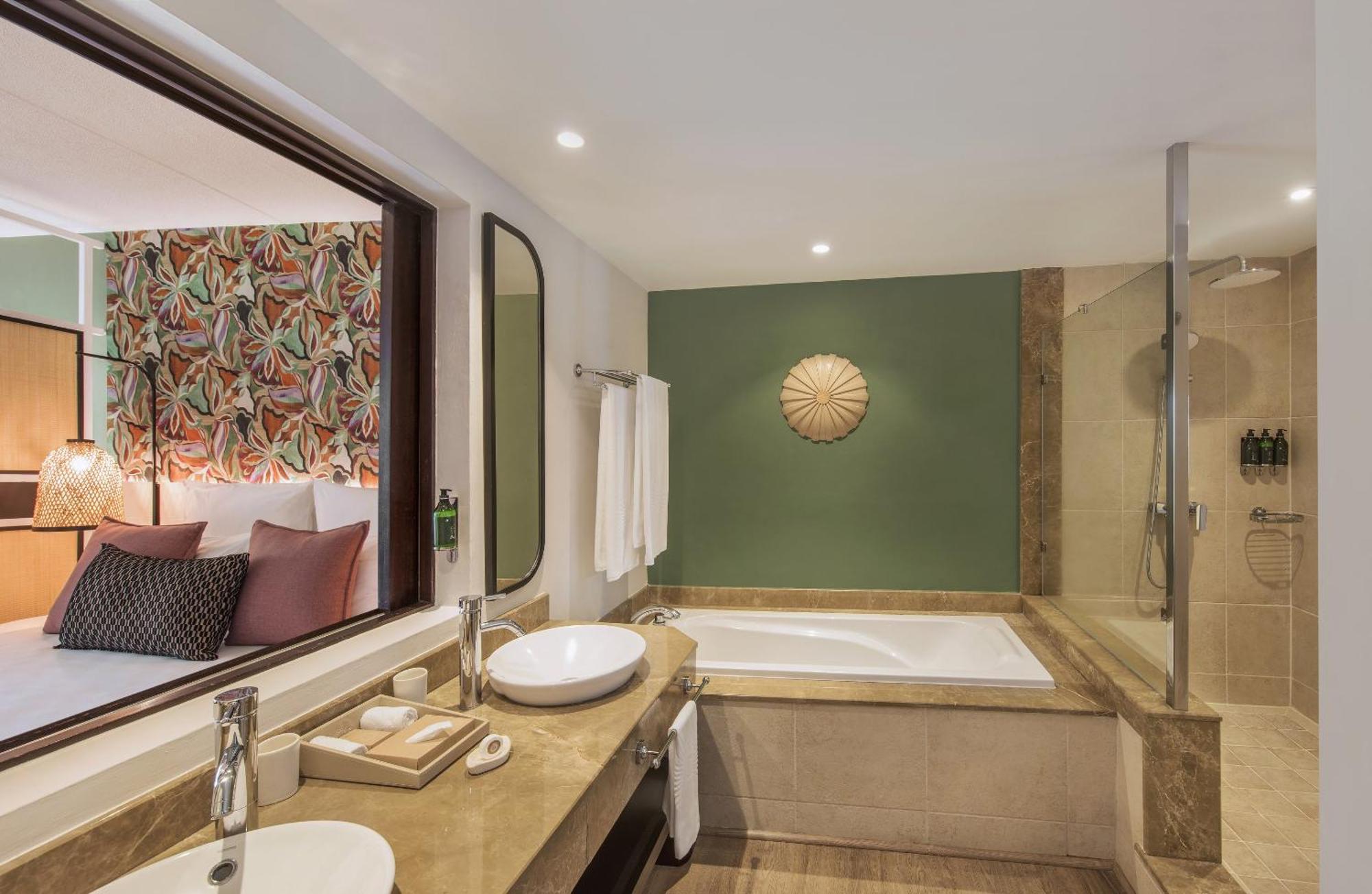 Chambre Deluxe - Rez-de-Chaussée (2 Adultes + 1 Enfant)