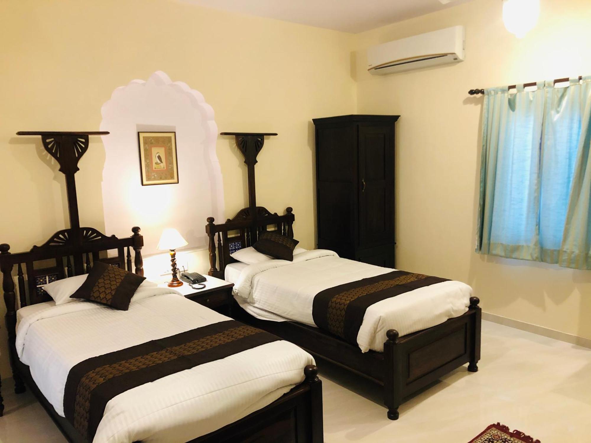 Chambre Deluxe Double ou Lits Jumeaux