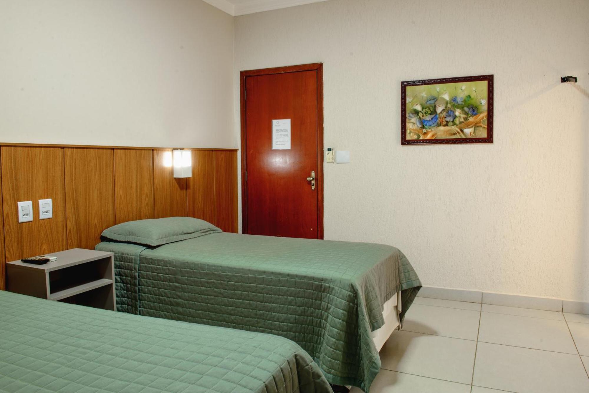 Quarto Triplo Deluxe com Banheiro Privativo