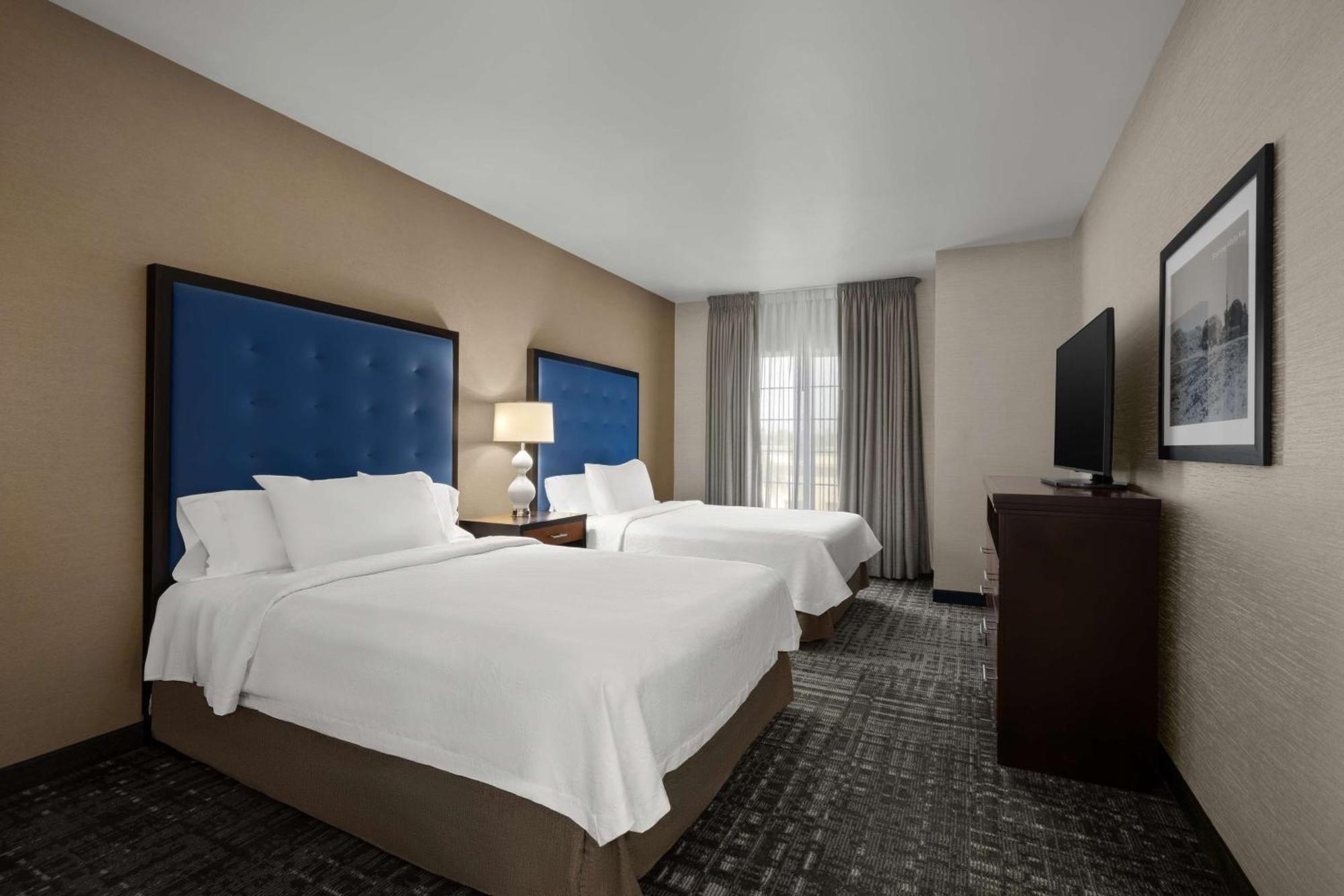 Two Bedroom Suite with One King and Two Queen Beds - Non-Smoking
