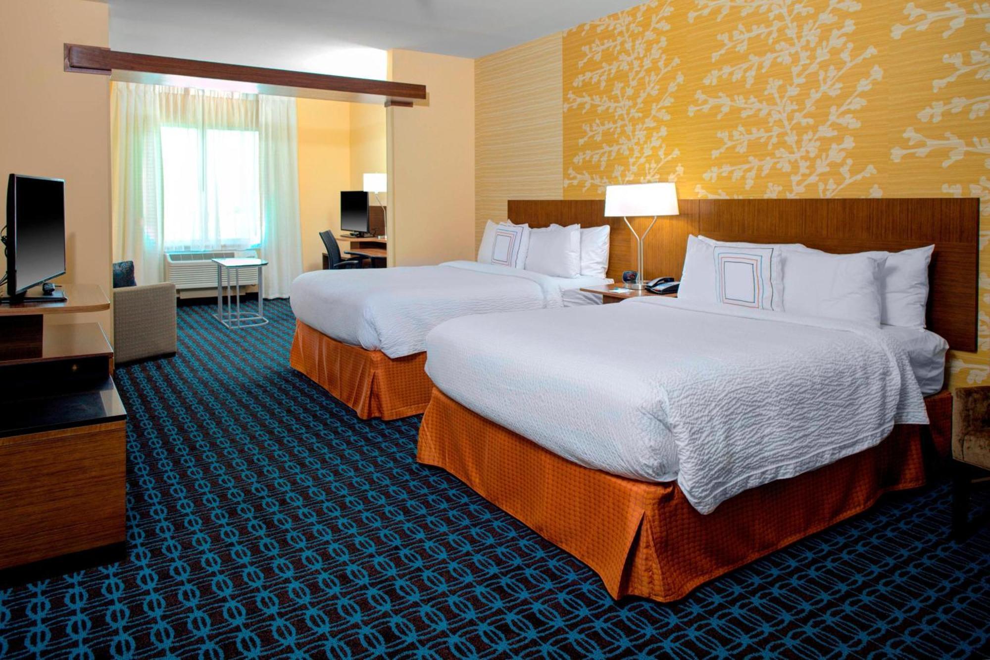 Queen Suite with Two Queen Beds and Sofa Bed