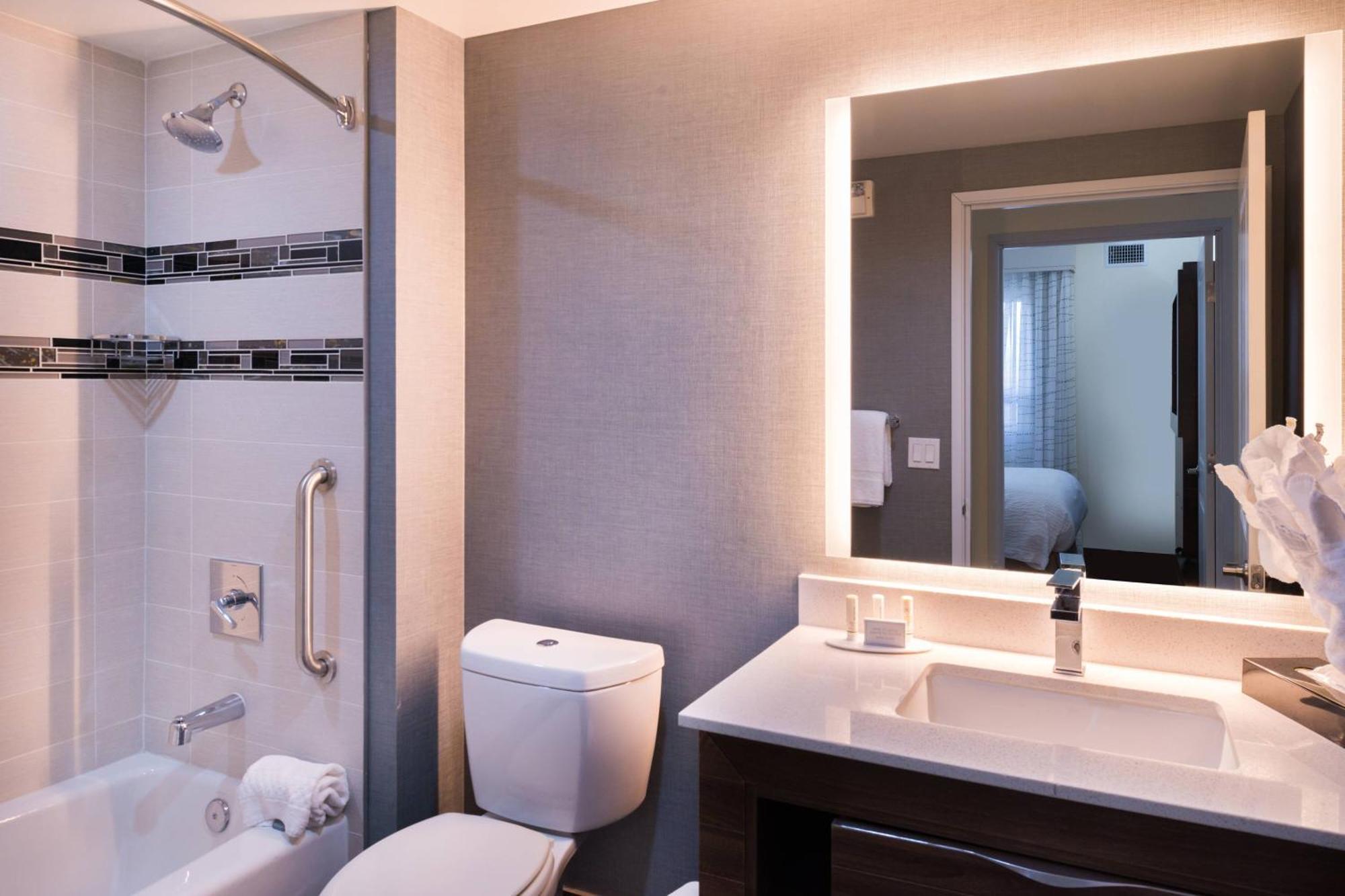 2 Bedroom Suite Bedroom 1 1 King Bedroom 2 1 Queen Mobility Accessible w or Tub,1634439169:JPEG