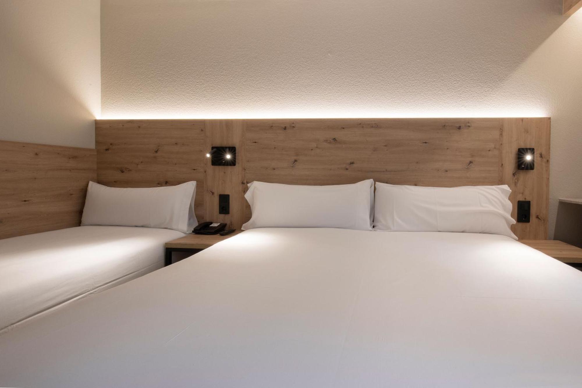 Habitación Triple con balcón