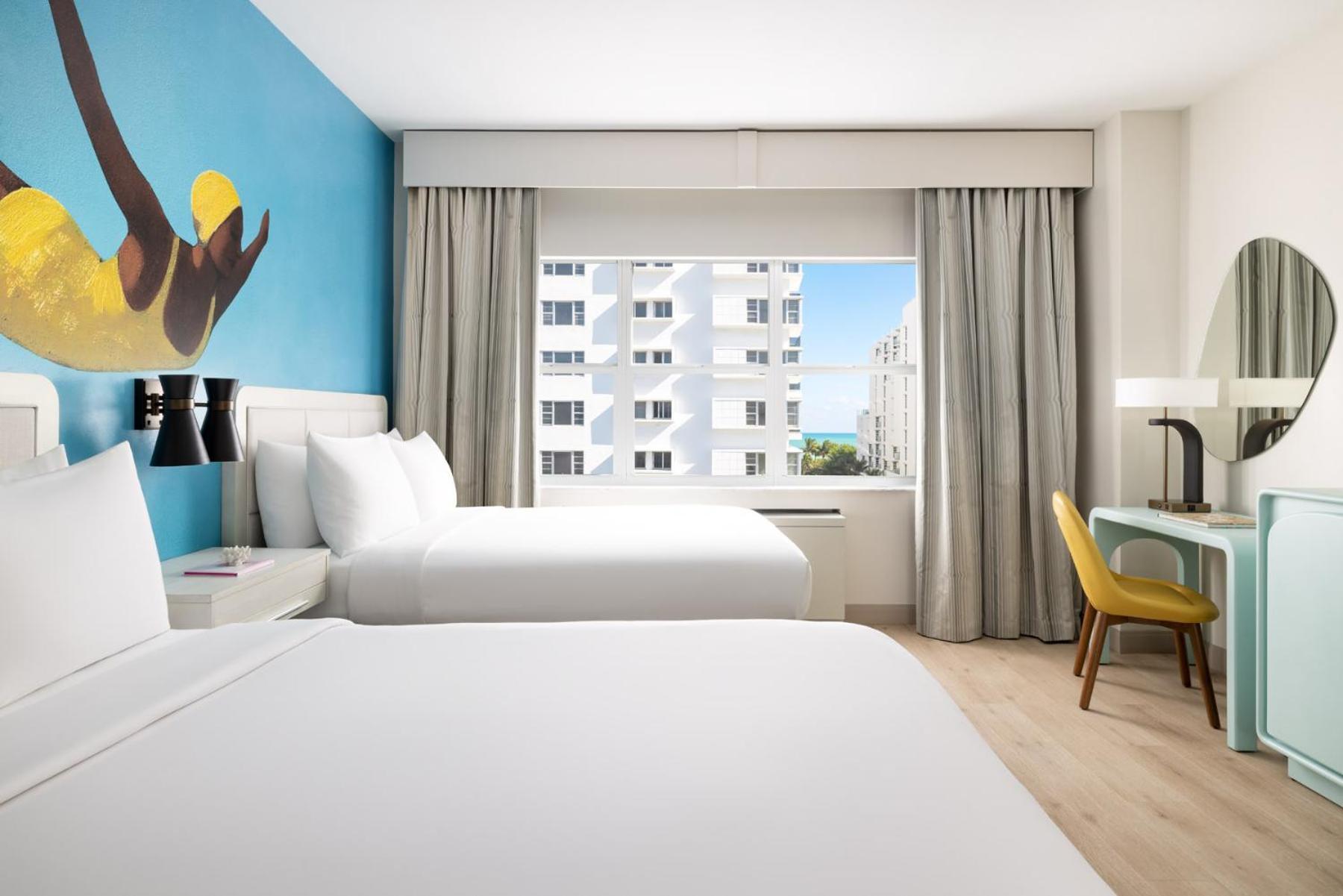 Queen Room with Two Queen Beds and Partial Ocean View