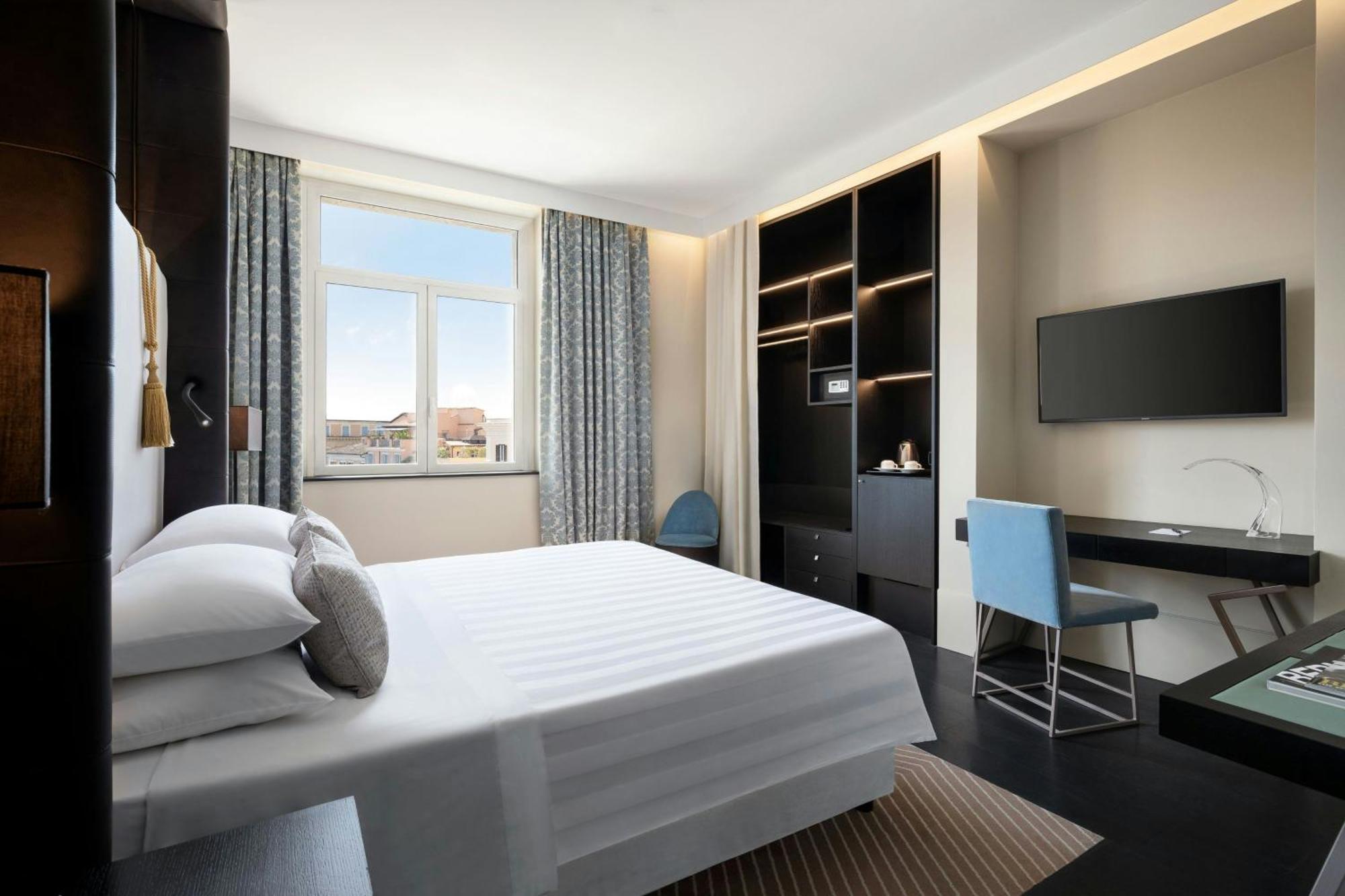 Quarto Executivo Deluxe com Cama King-size e Vista da Cidade