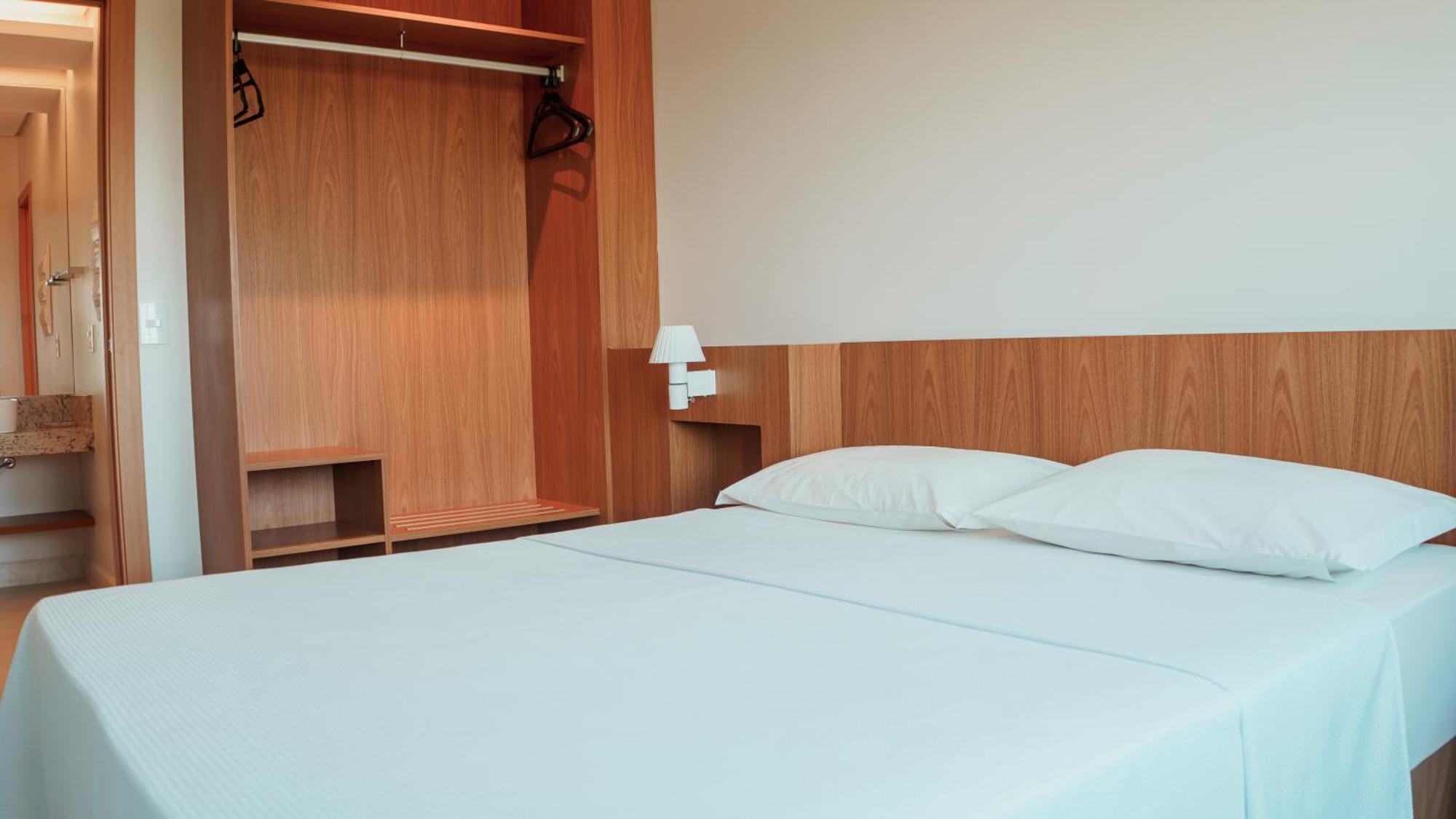Quarto Deluxe (2 Adultos + 1 Criança)