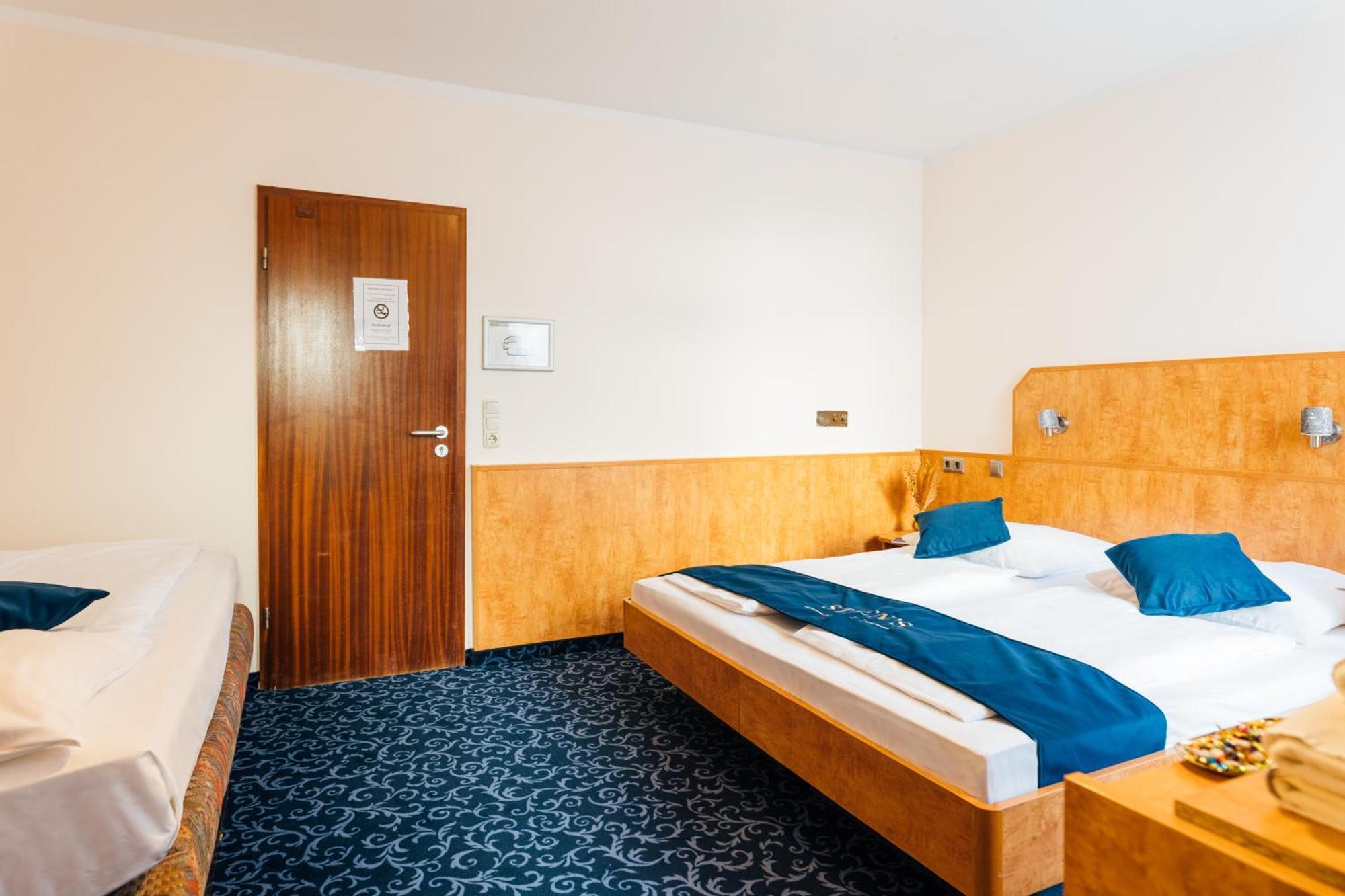 Dreibettzimmer
