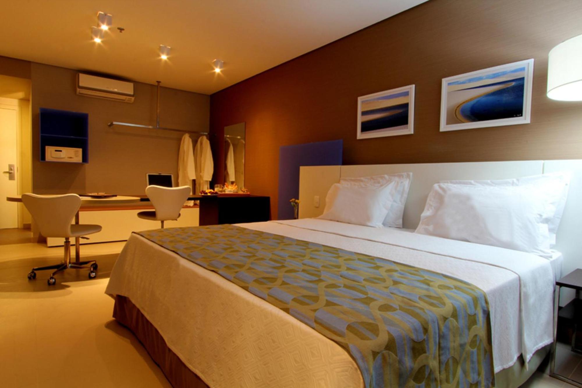 Quarto duplo standard com cama king-size