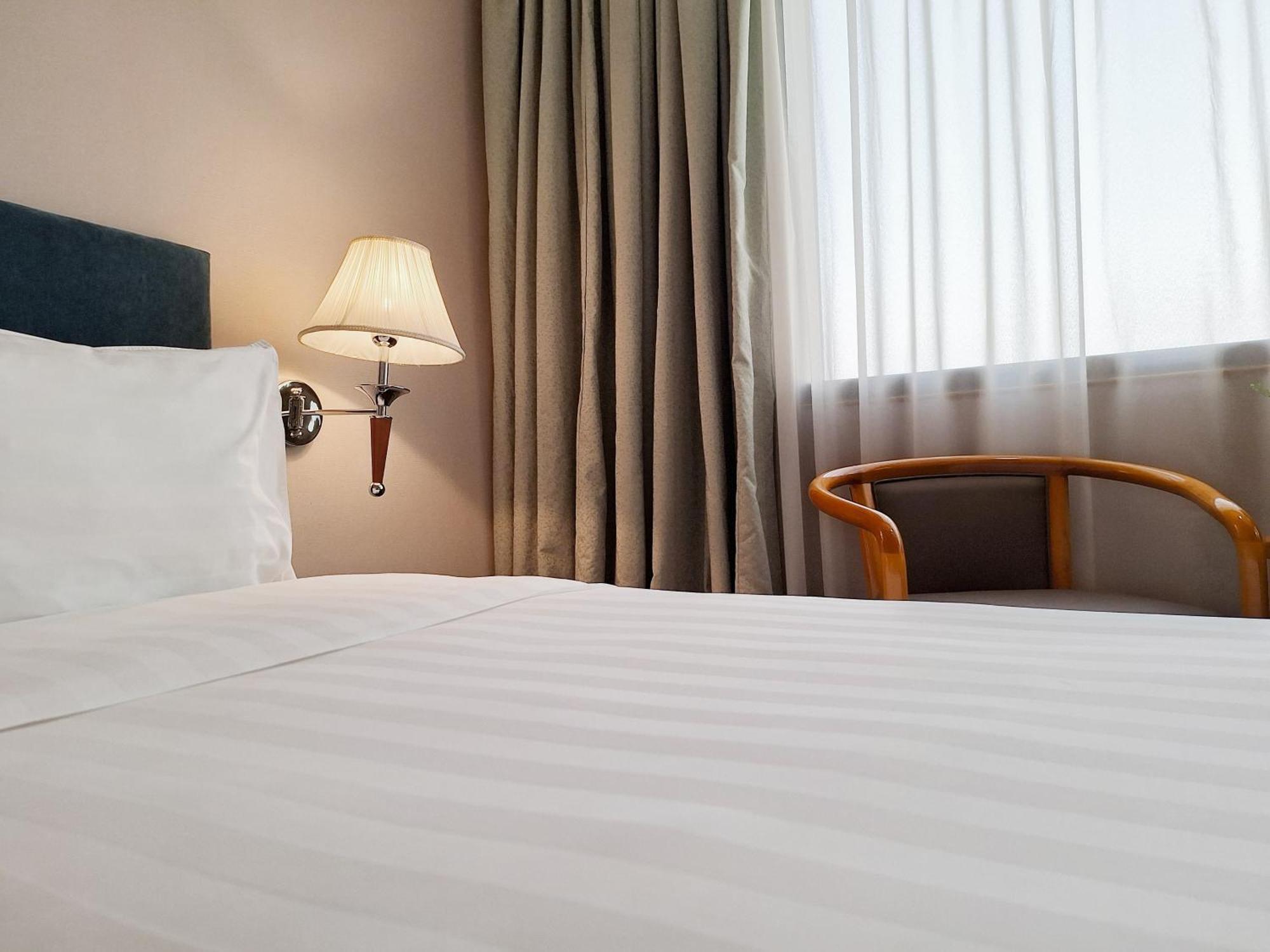 Quarto Deluxe com Cama de Casal ou 2 de Solteiro