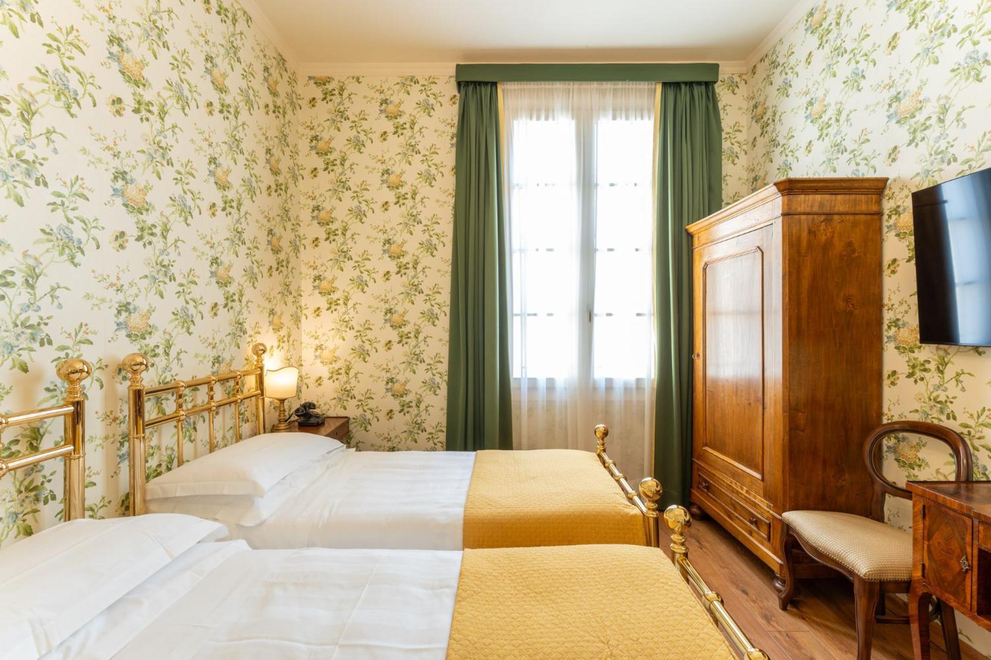 Suíte de 2 Quartos (4 Adultos)