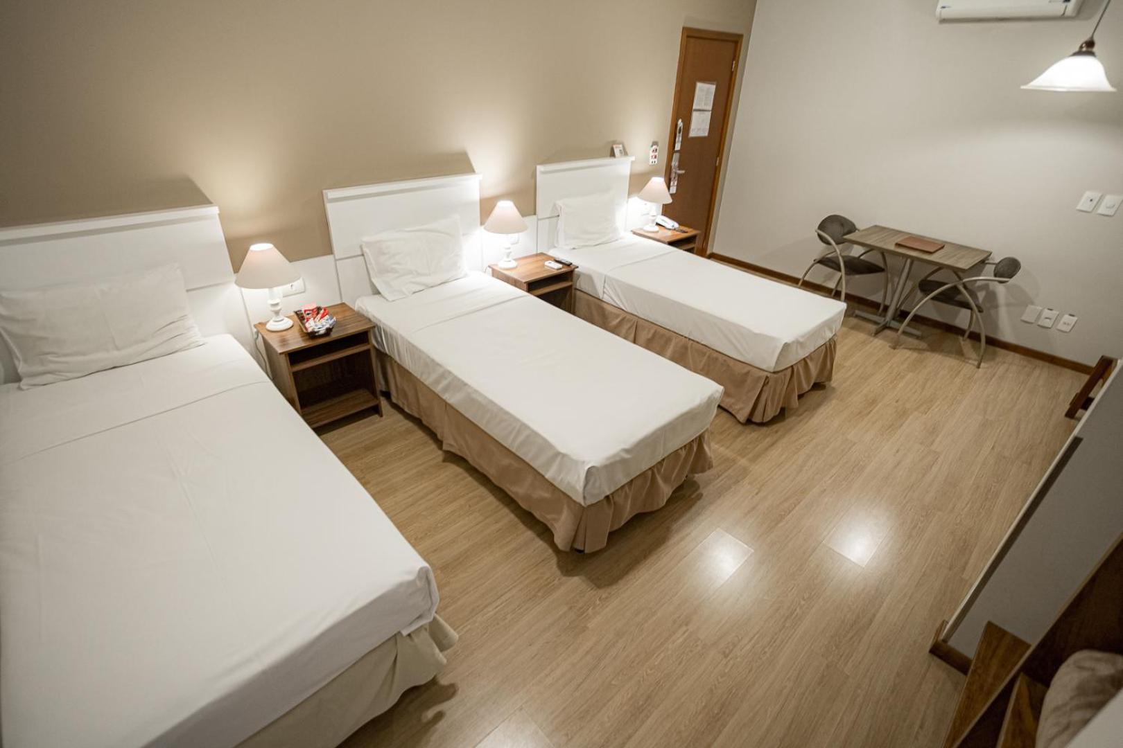 Quarto Triplo Executivo