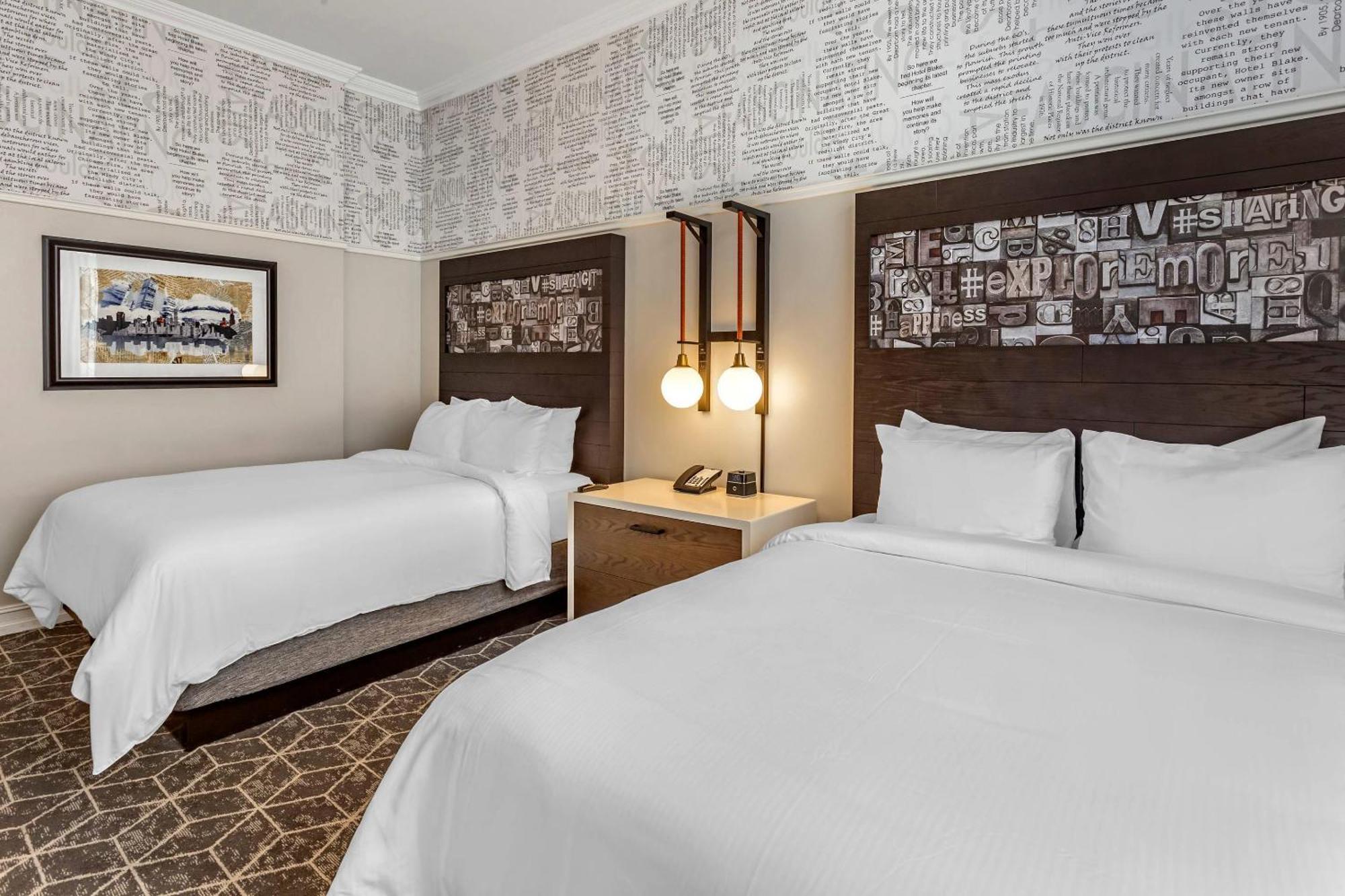 Kamer met 2 Queensize Bedden - Rookvrij