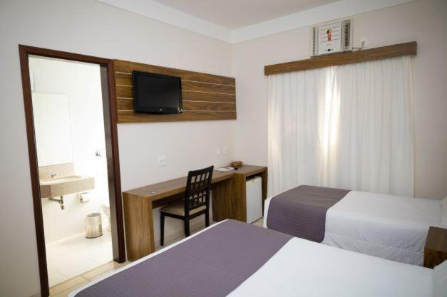 Quarto Triplo Superior