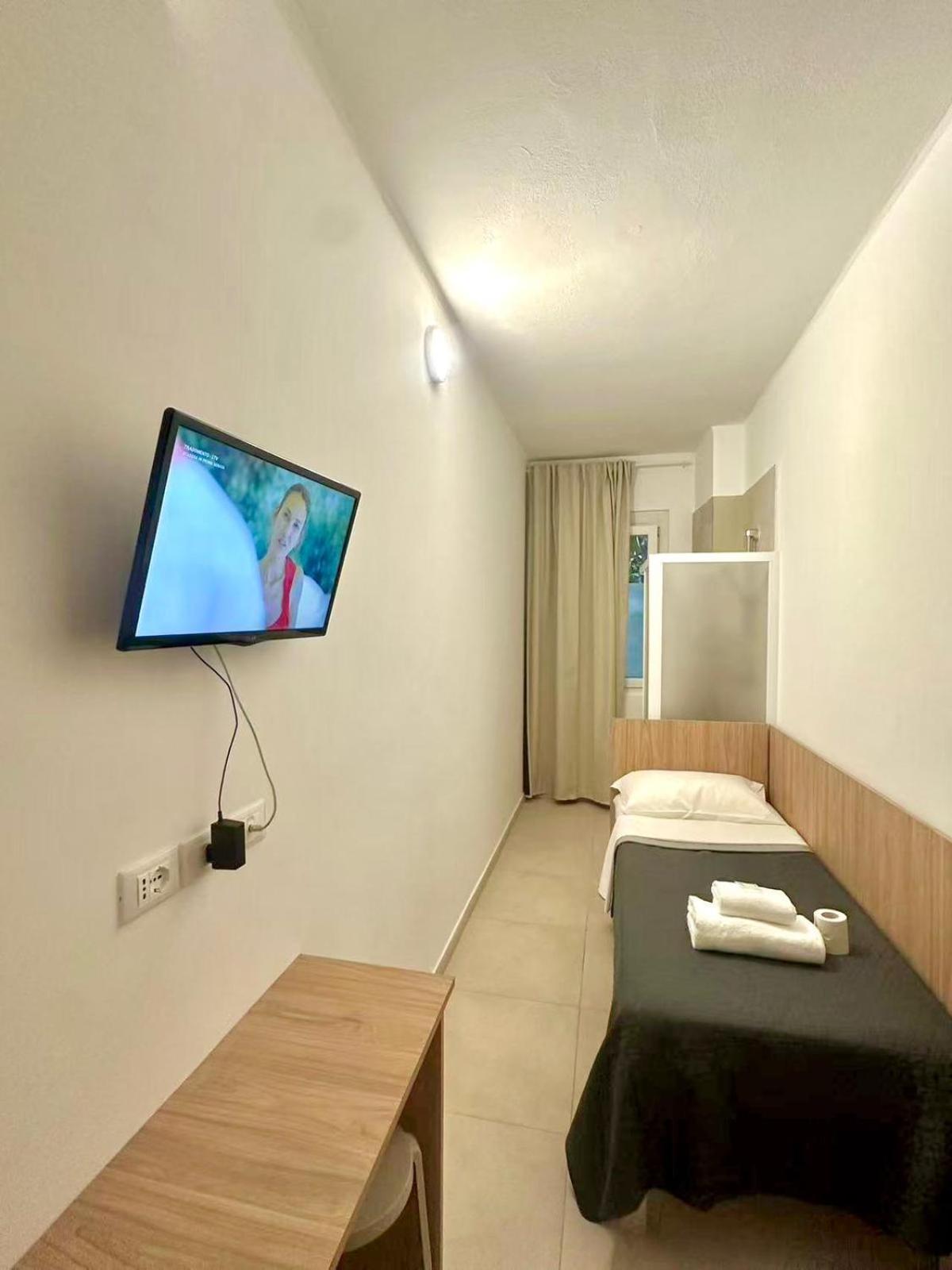 Quarto Individual com Casa de Banho Partilhada