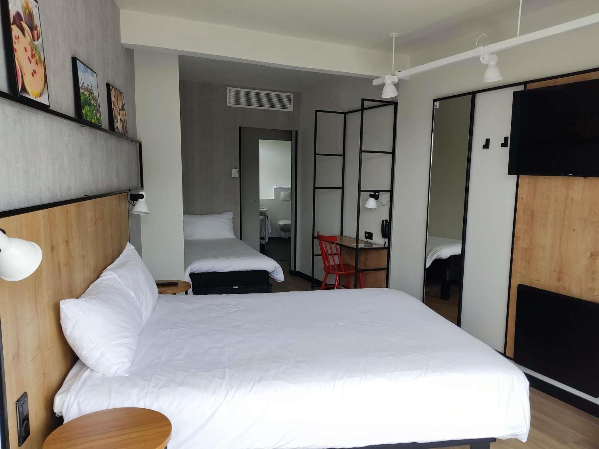 Standard Room with One Double Bed and One Single Bed and Balcony