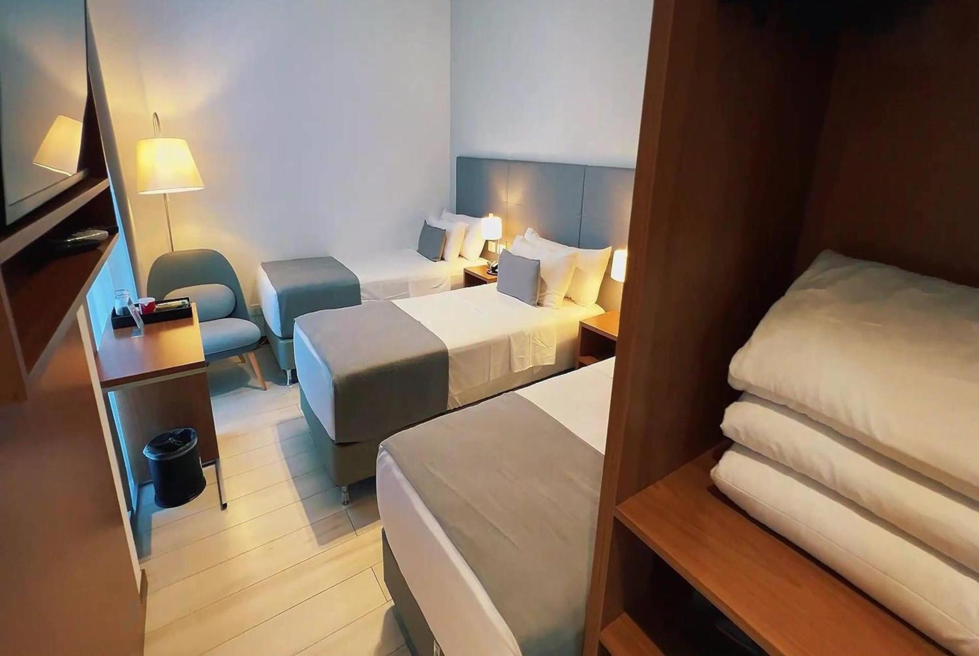 Quarto Triplo com 3 Camas de Solteiro - Não Fumantes