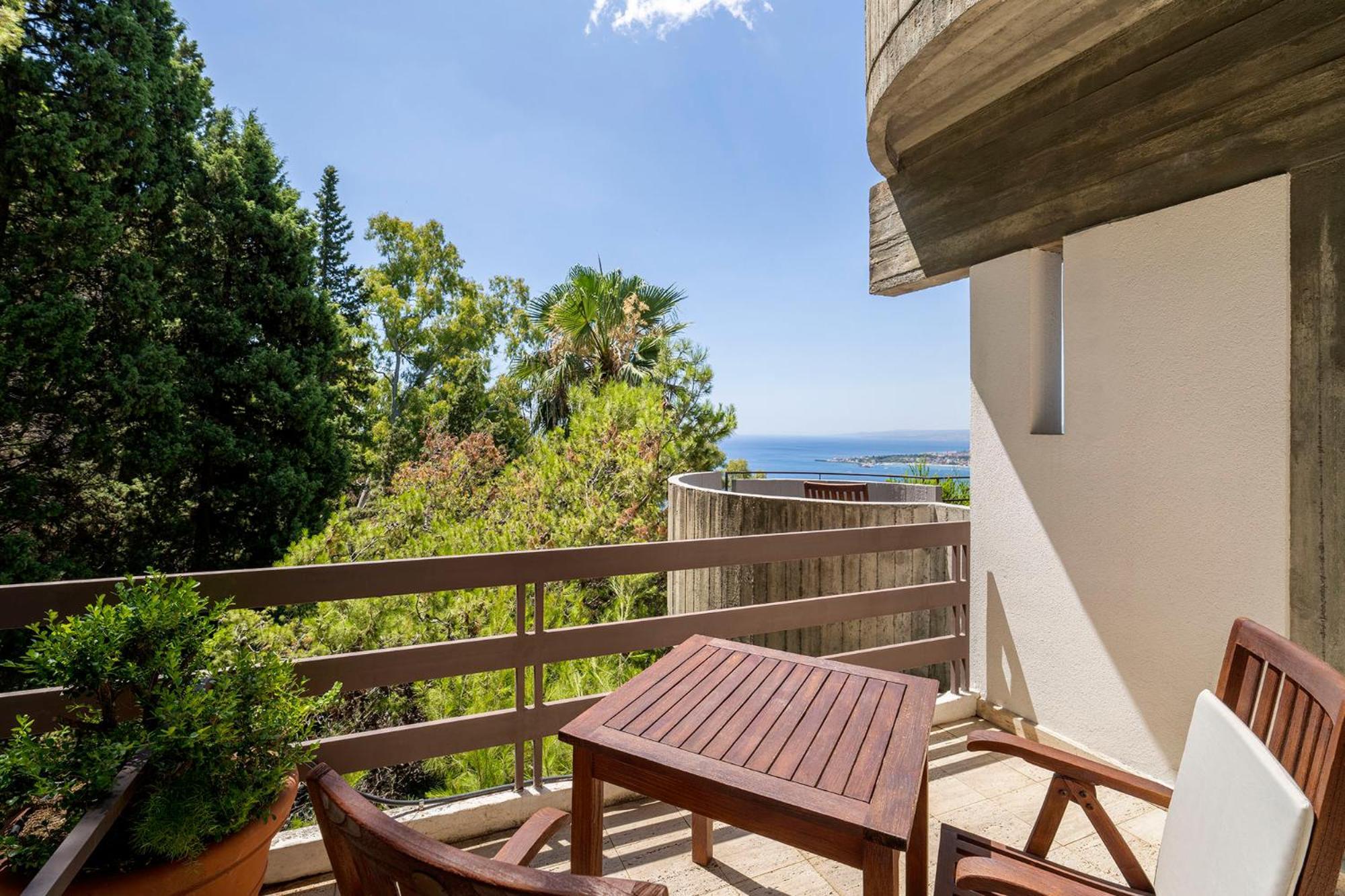 Double Room with Balcony and Partial Sea View,1706782363:JPEG