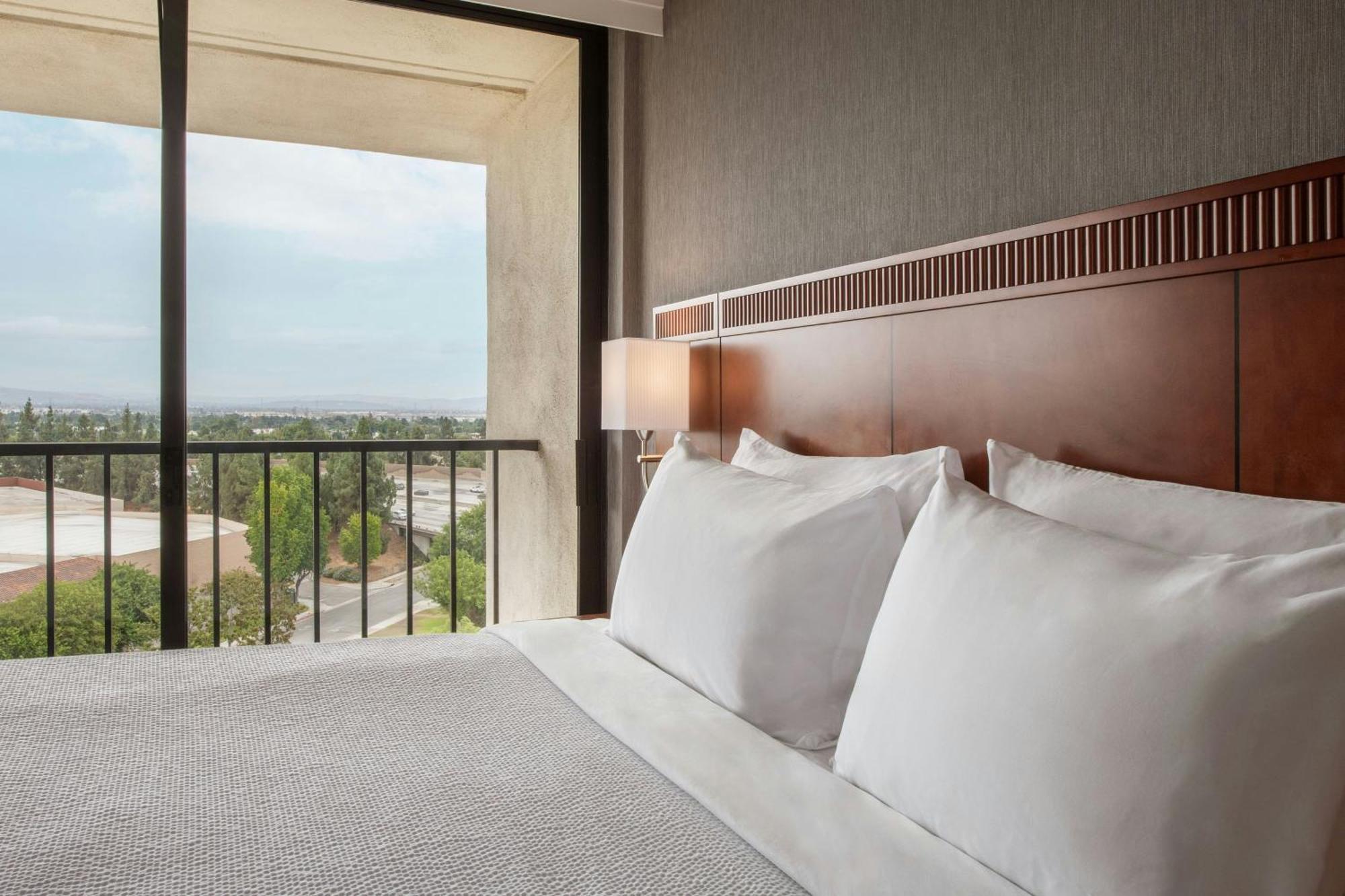 One-Bedroom Junior King Suite with Sofa Bed and City View