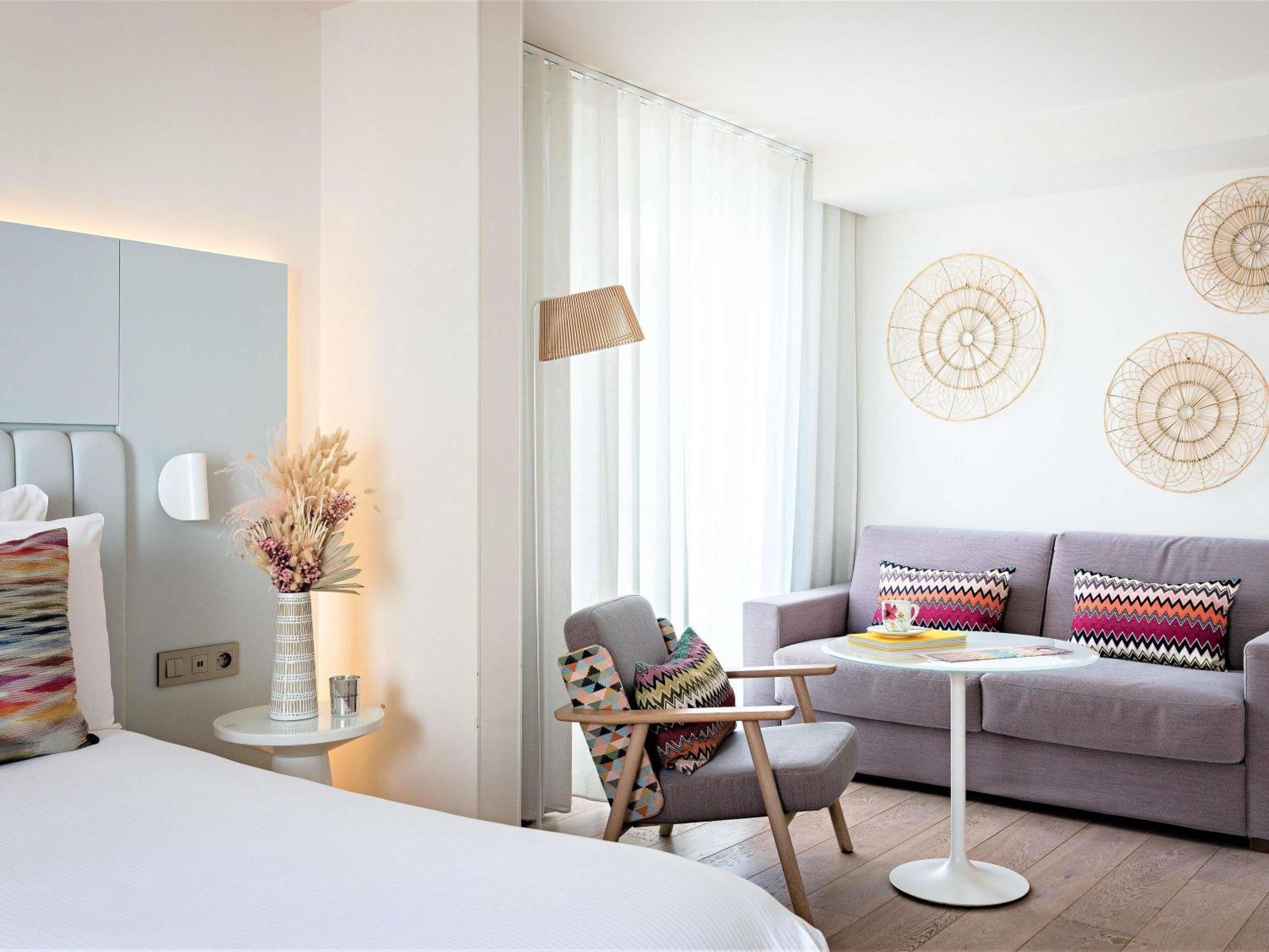 Junior Suite met Kingsize Bed of 2 Aparte Bedden en een Slaapbank