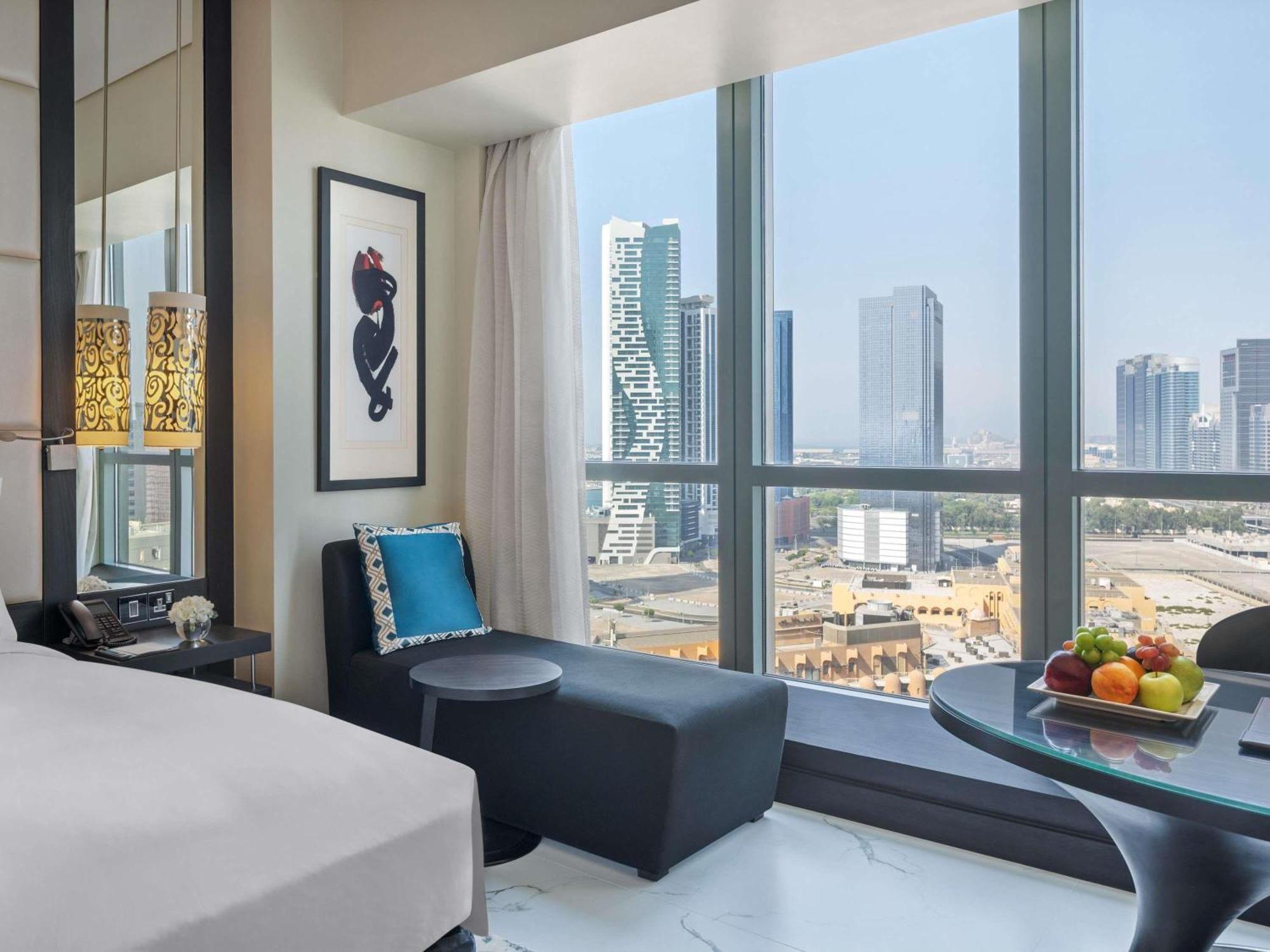 Quarto Superior com 2 Camas de Solteiro Vista da Cidade