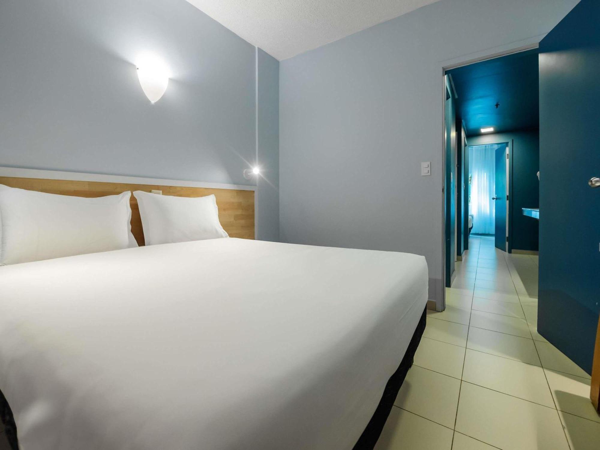 Standard Apartment with One Double Bed and Two Single Beds