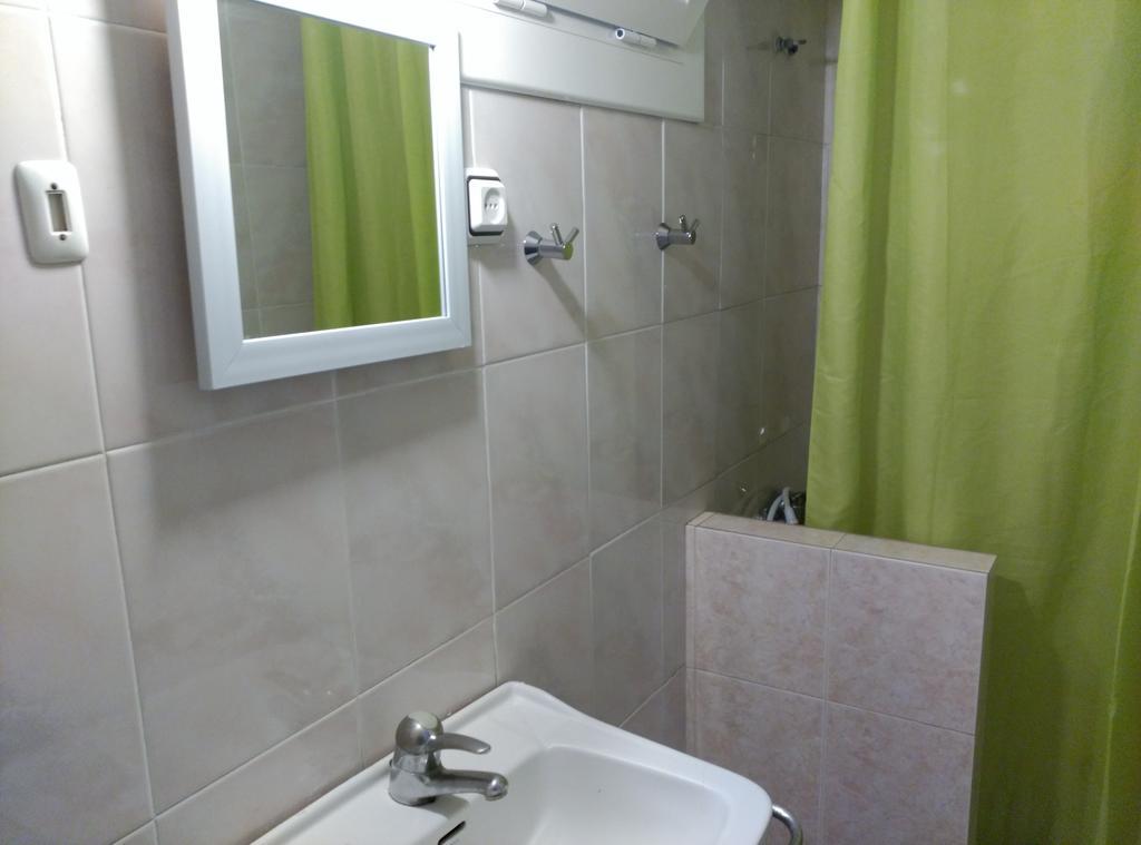 Quarto Triplo com Casa de Banho Partilhada