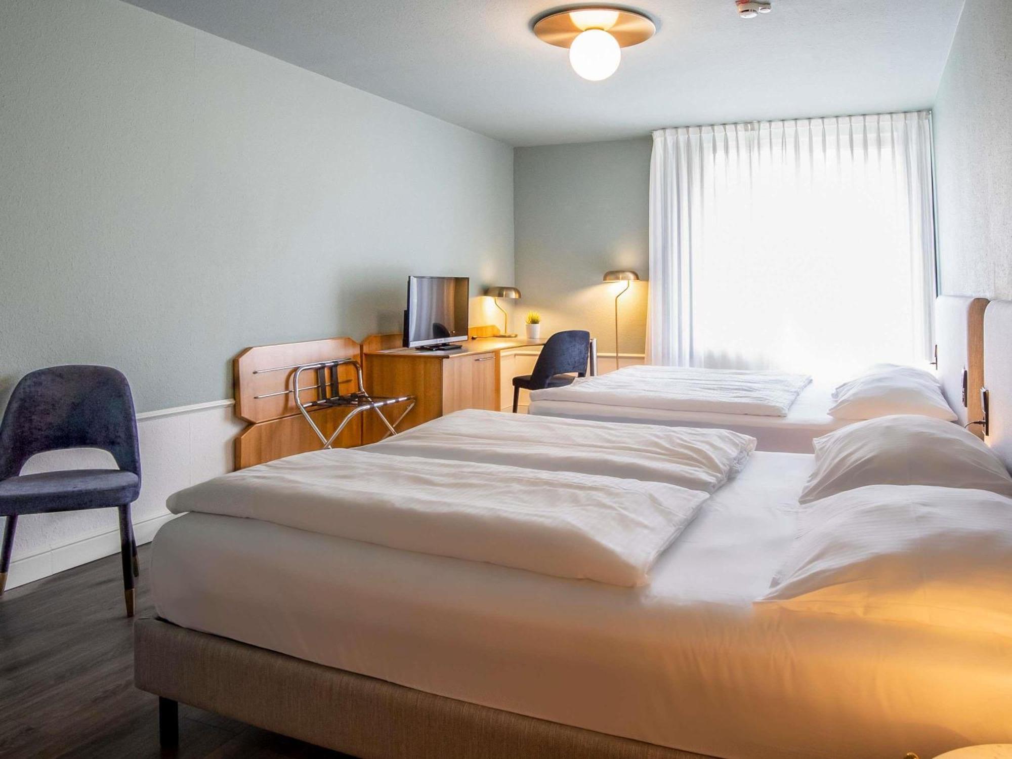 Klassieke Familiekamer met 2 Queensize Bedden