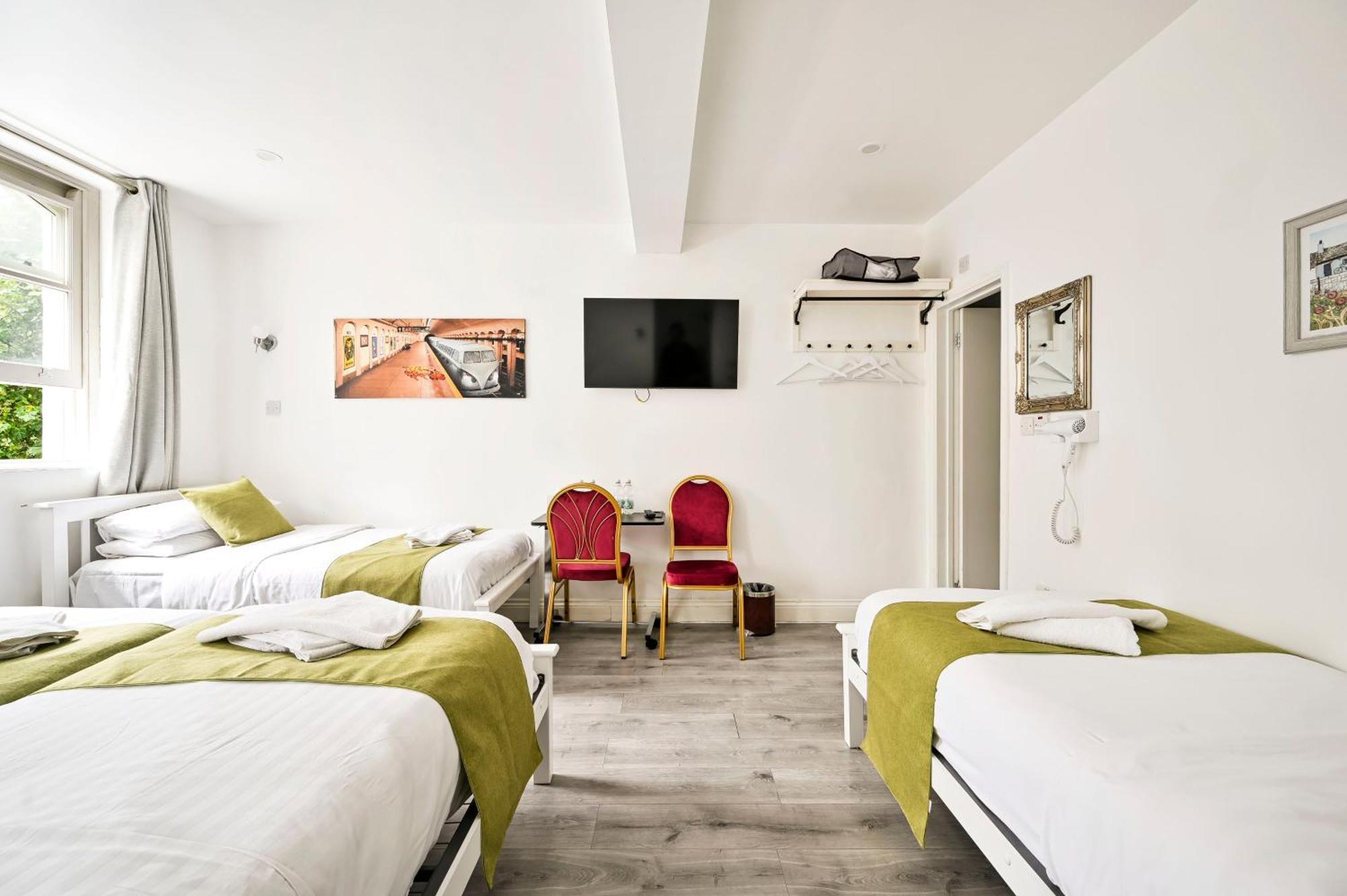 Chambre Quadruple avec Salle de Bains Privative