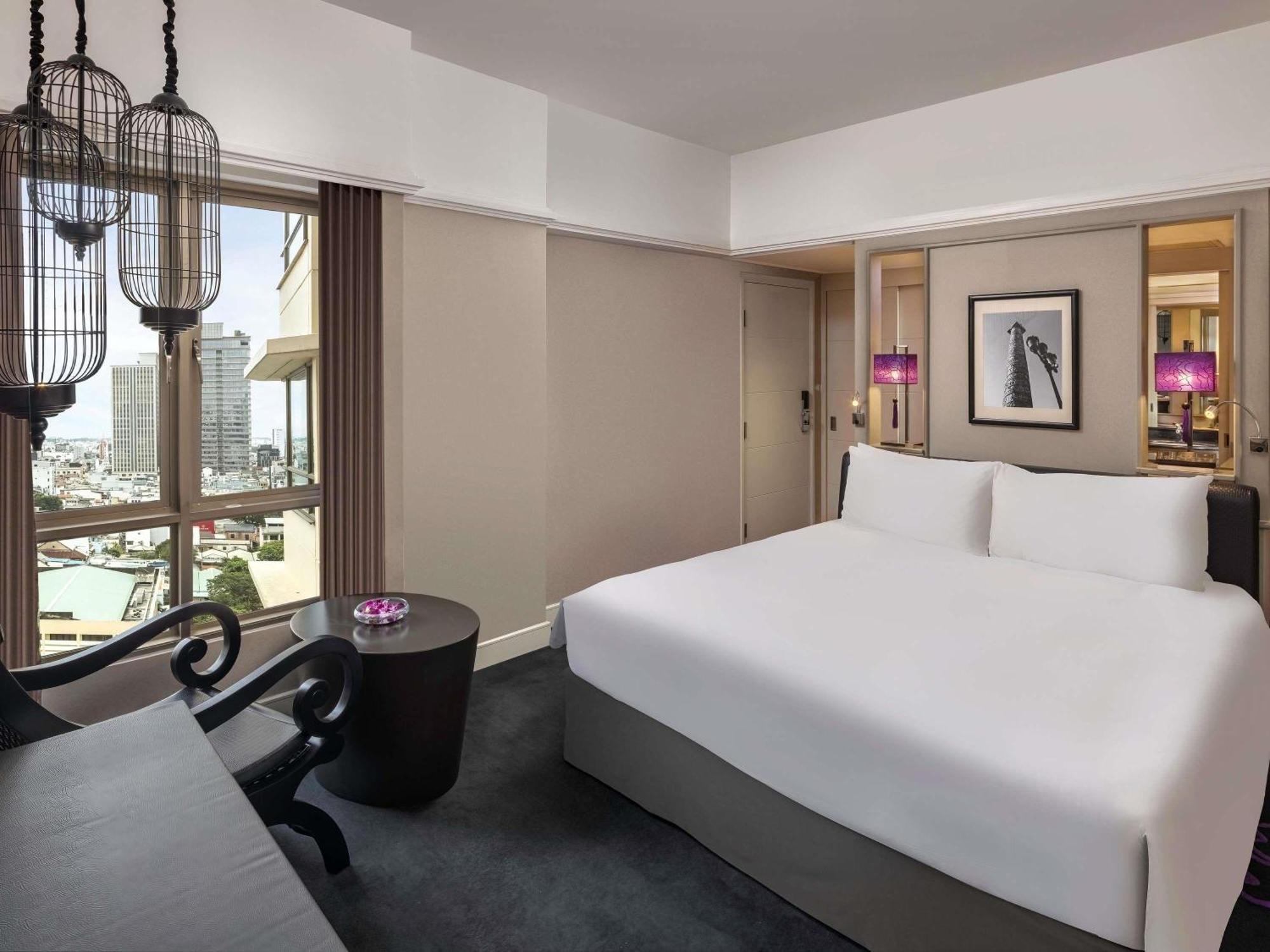 Habitación Clásica con cama extragrande y vistas a la ciudad