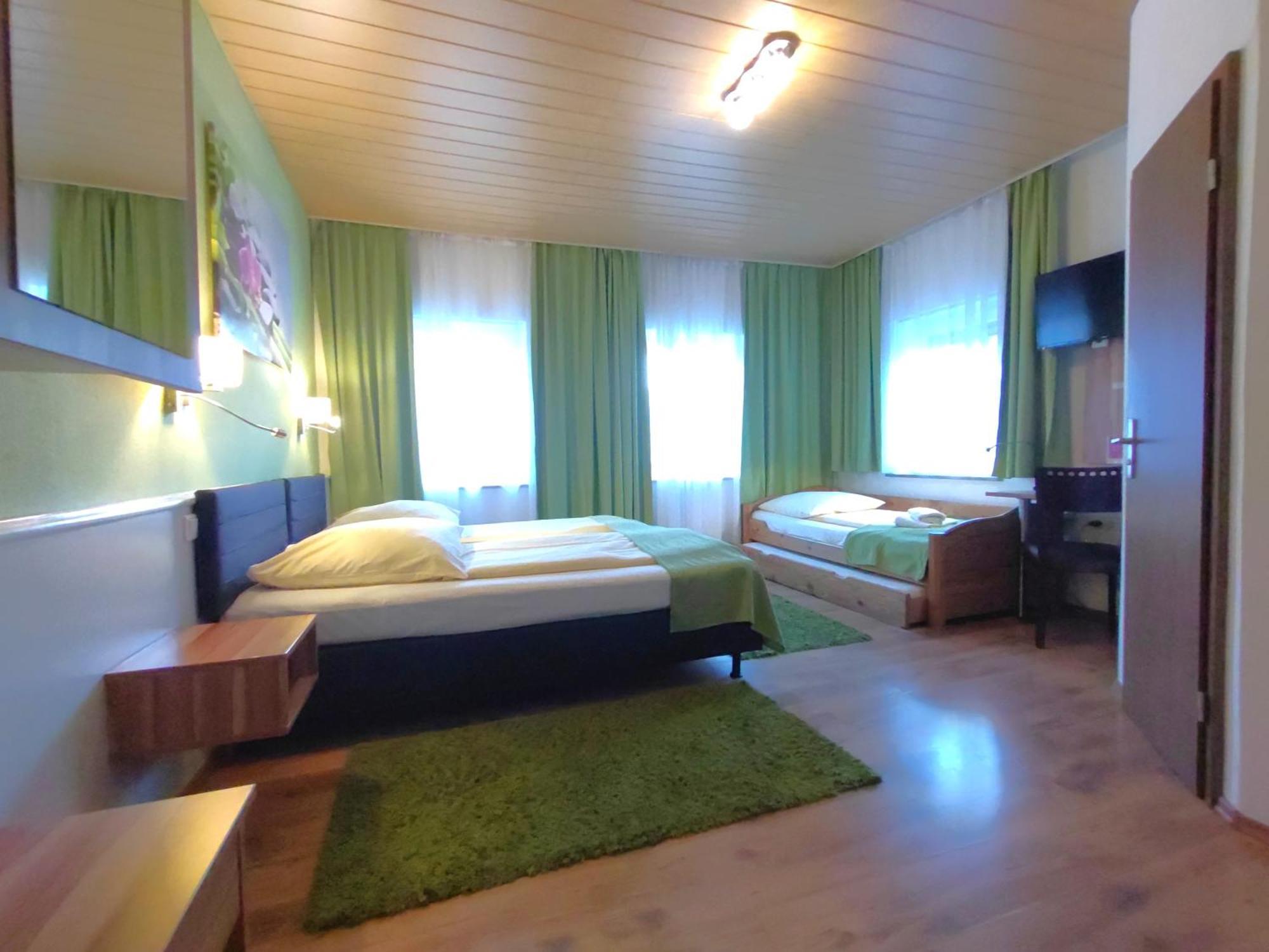 Dreibettzimmer