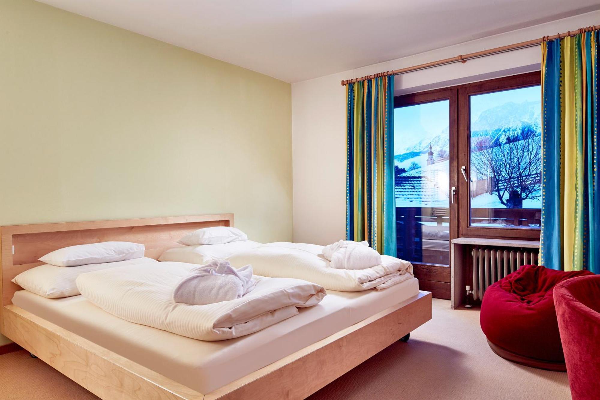 Dreibettzimmer mit Balkon