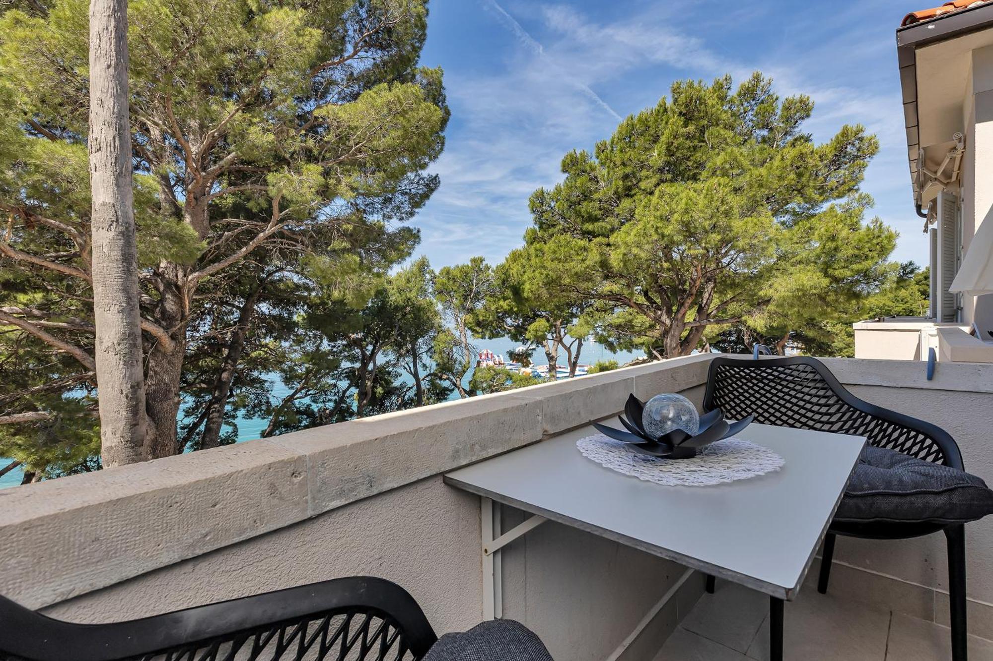 Camera Tripla Deluxe con Balcone e Vista Mare