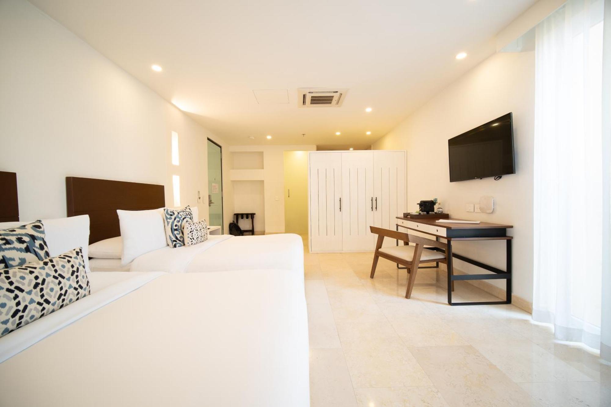 Quarto Duplo Superior com 2 Camas de Casal e Vista