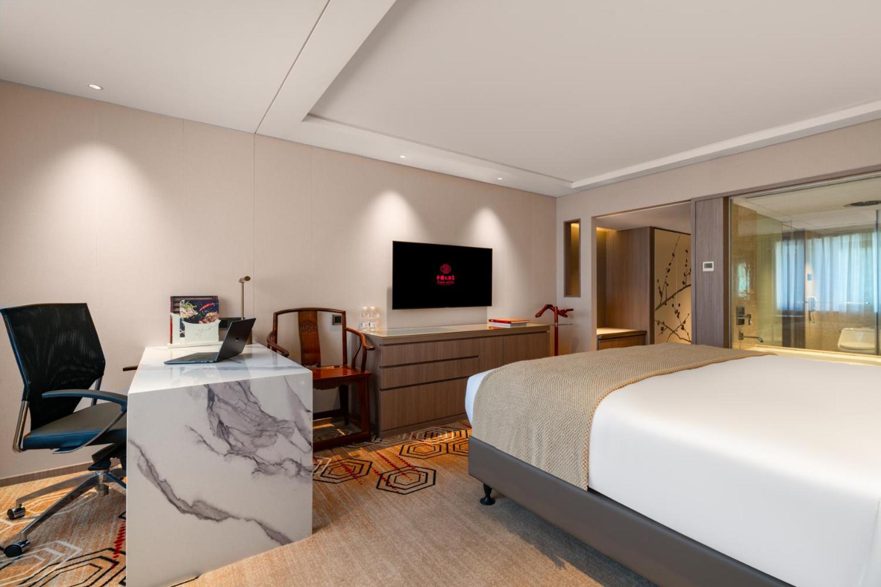Quarto Executivo com Cama King-size ou 2 de Solteiro