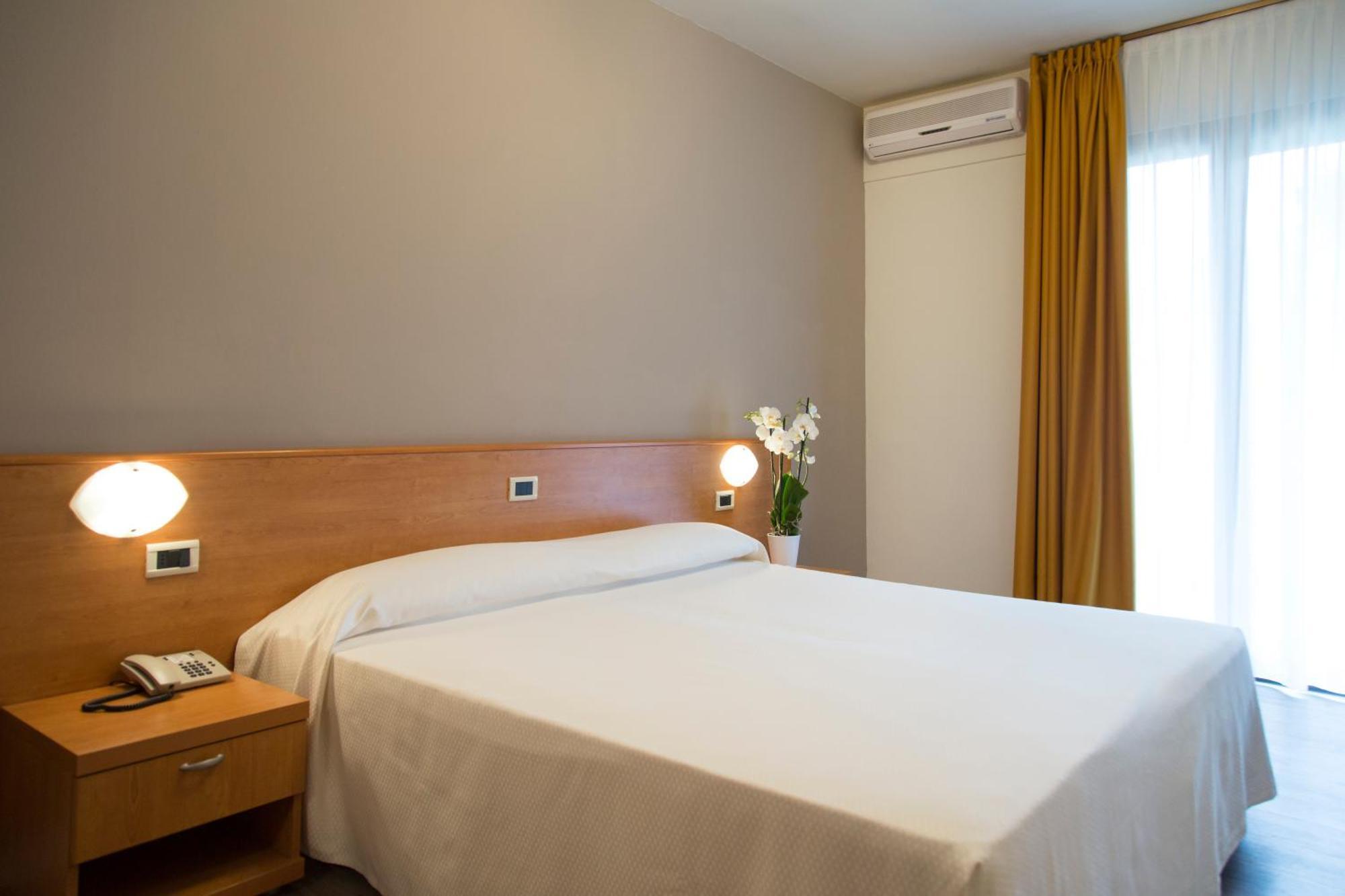 Quarto Standard com Cama de Casal ou 2 de Solteiro