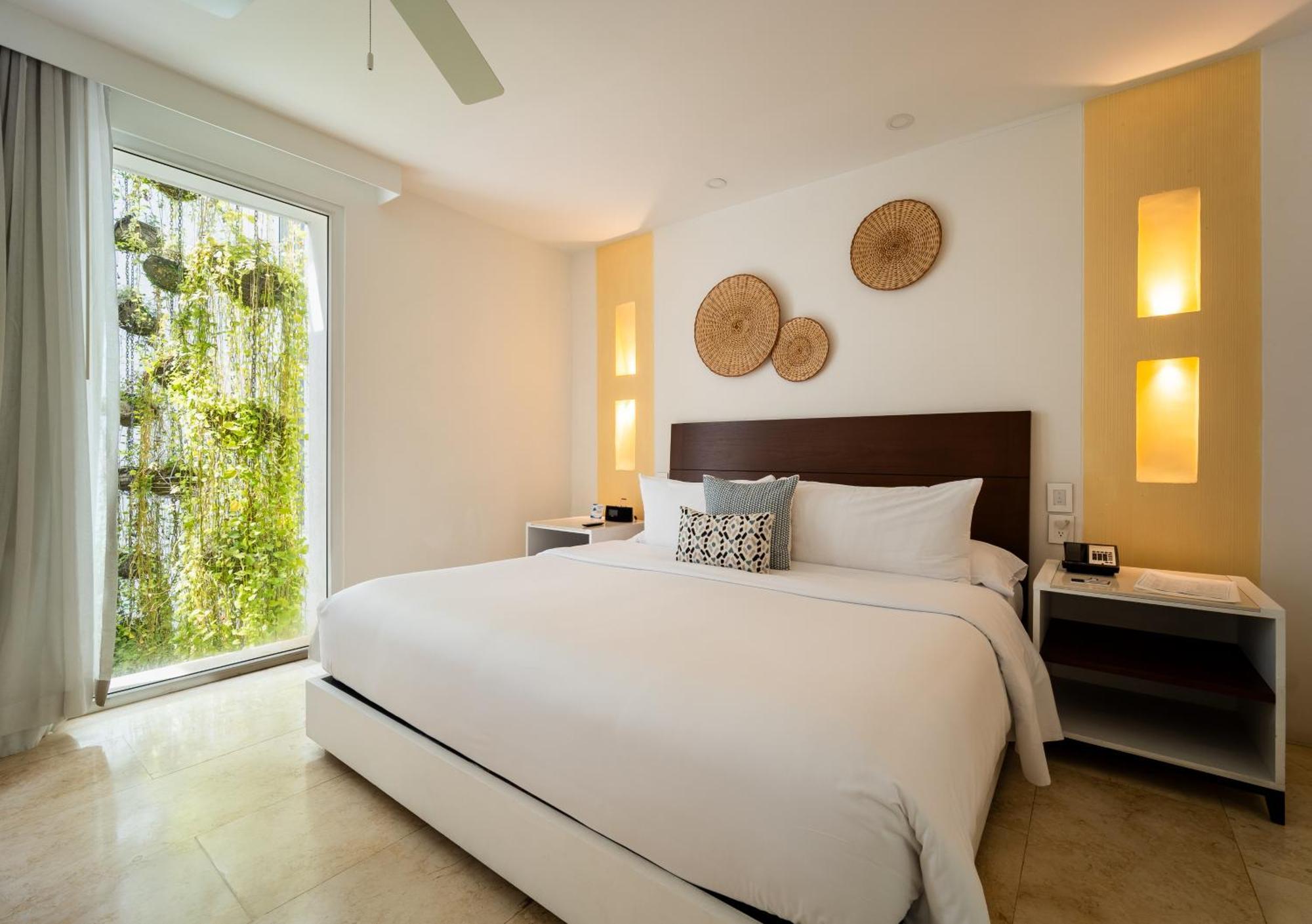 Quarto King com Varanda e Vista do Jardim