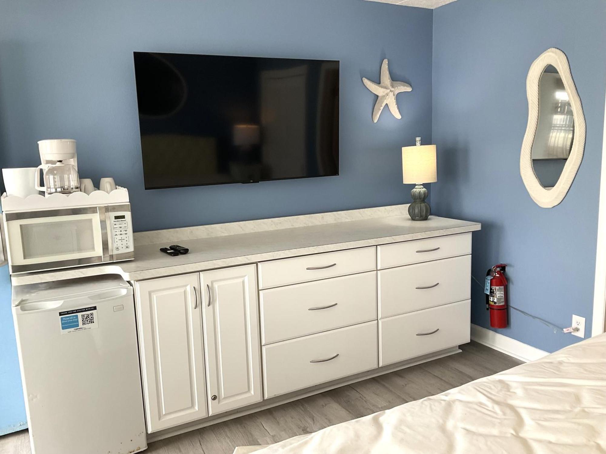 Poolside motel room with a king bed,1756560988:JPEG