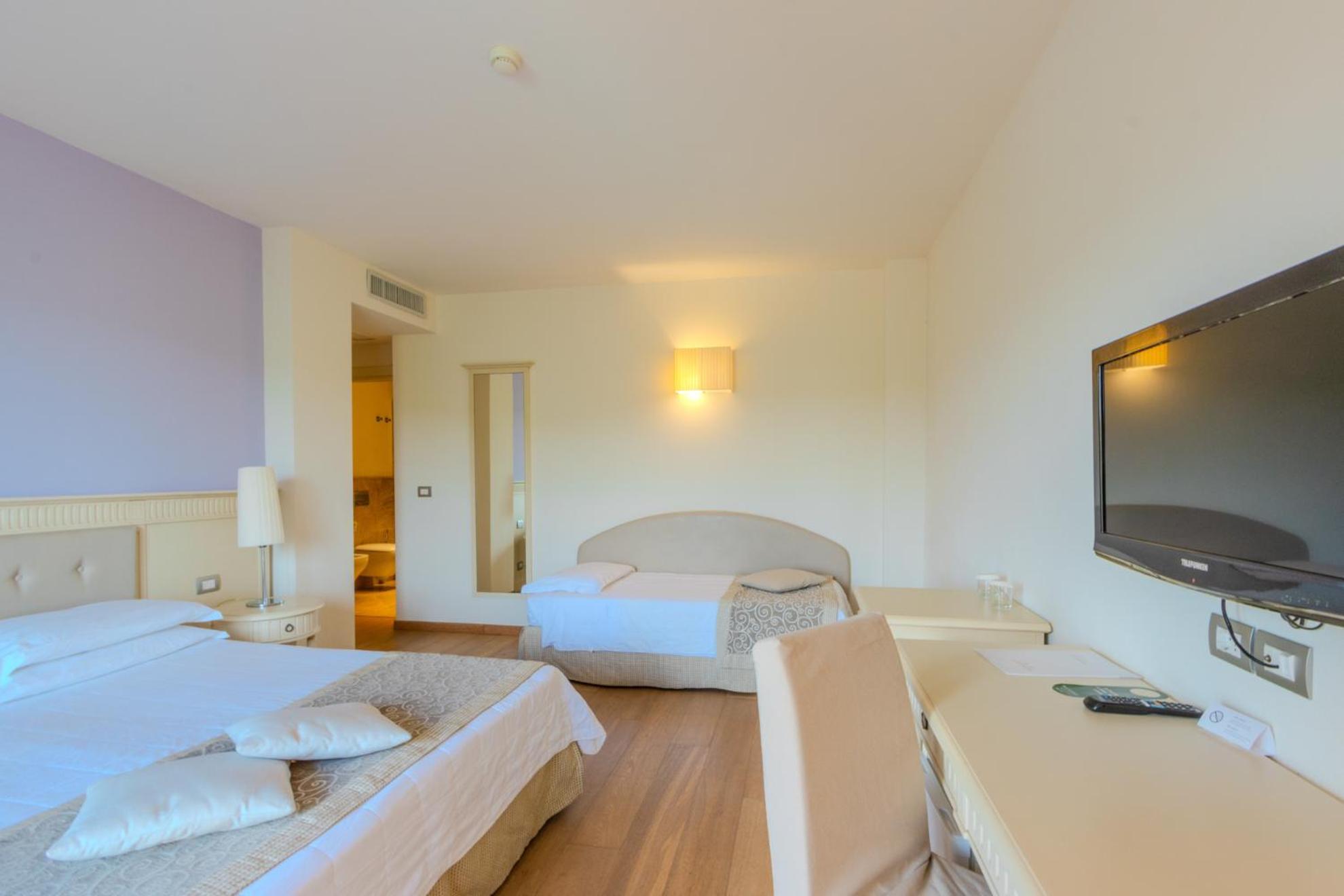 Camera Tripla con Balcone Privato