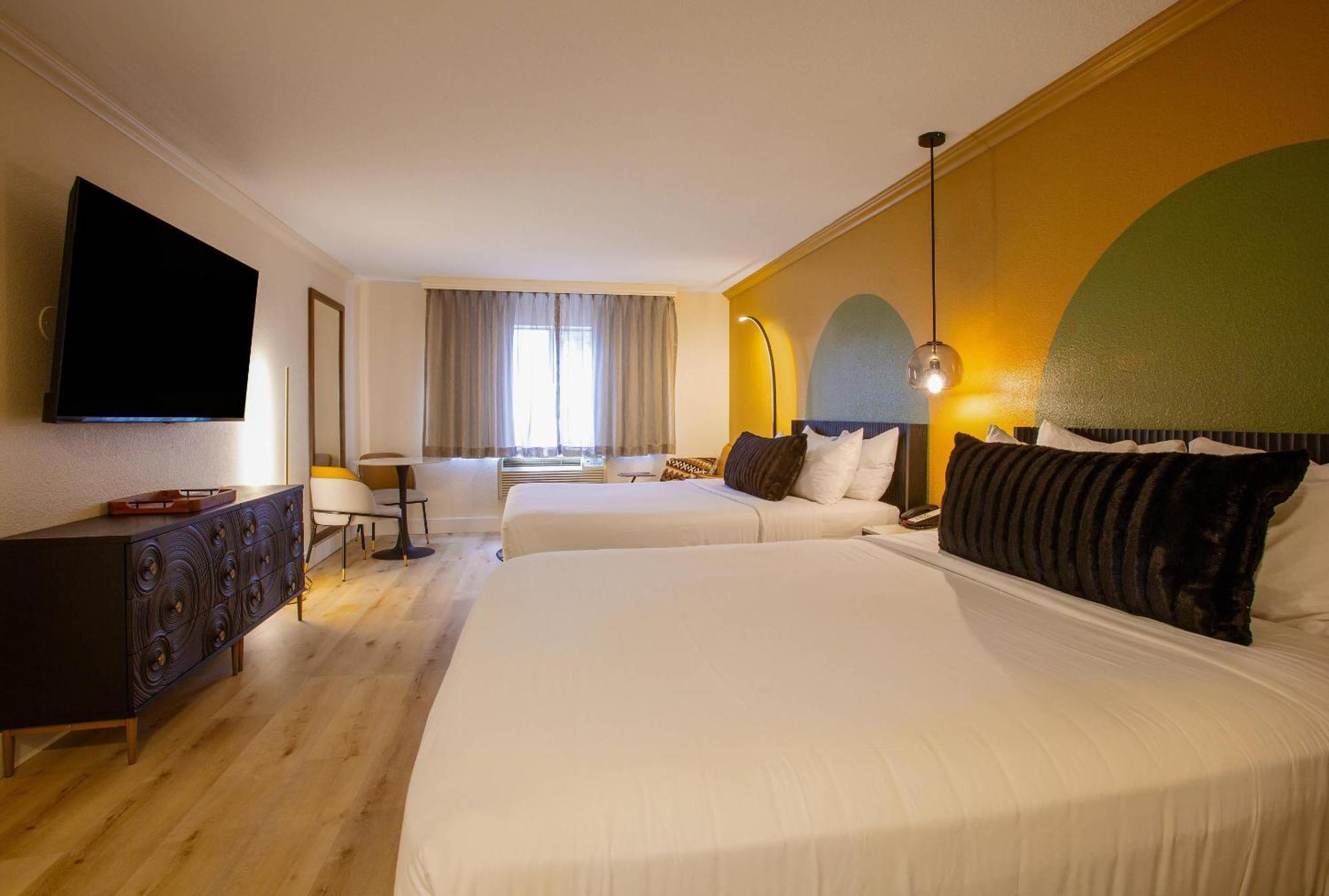 Room with Two Queen Beds and Sofa,1758293106:JPEG