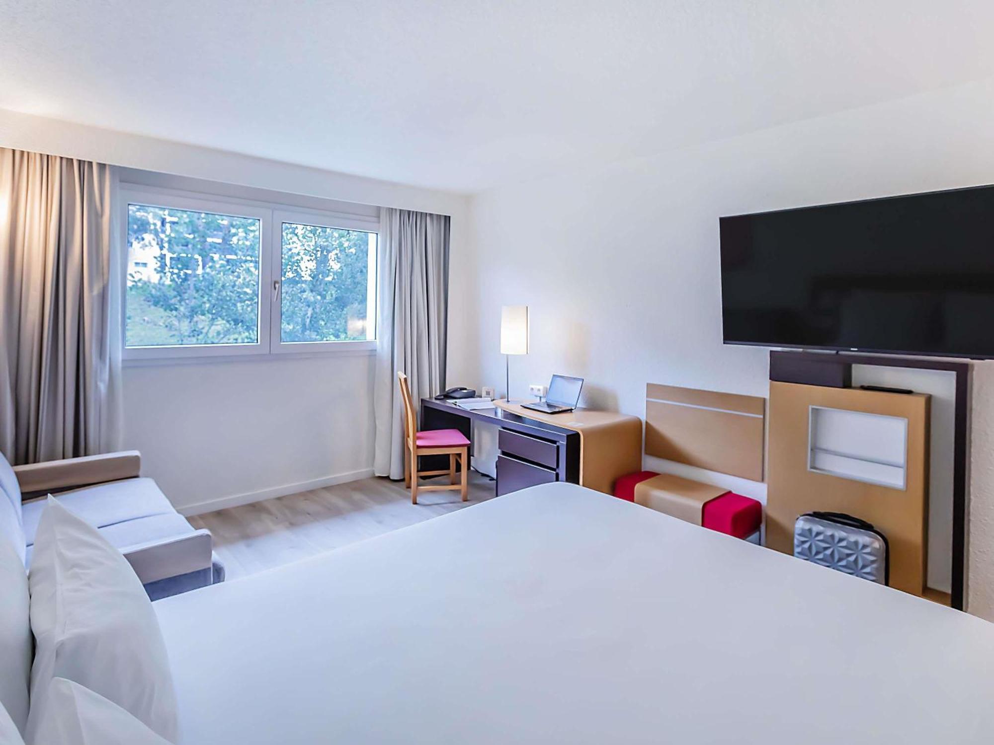 Habitación Estándar con sofá cama - 1 cama grande