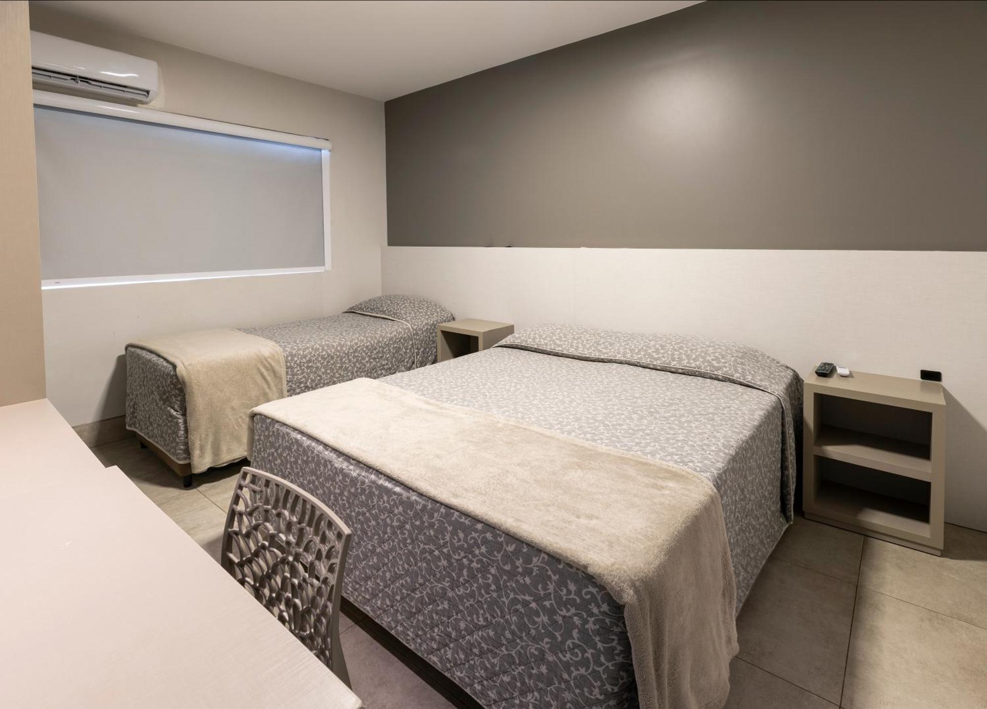 Quarto Triplo Standard com 3 Camas de Solteiro