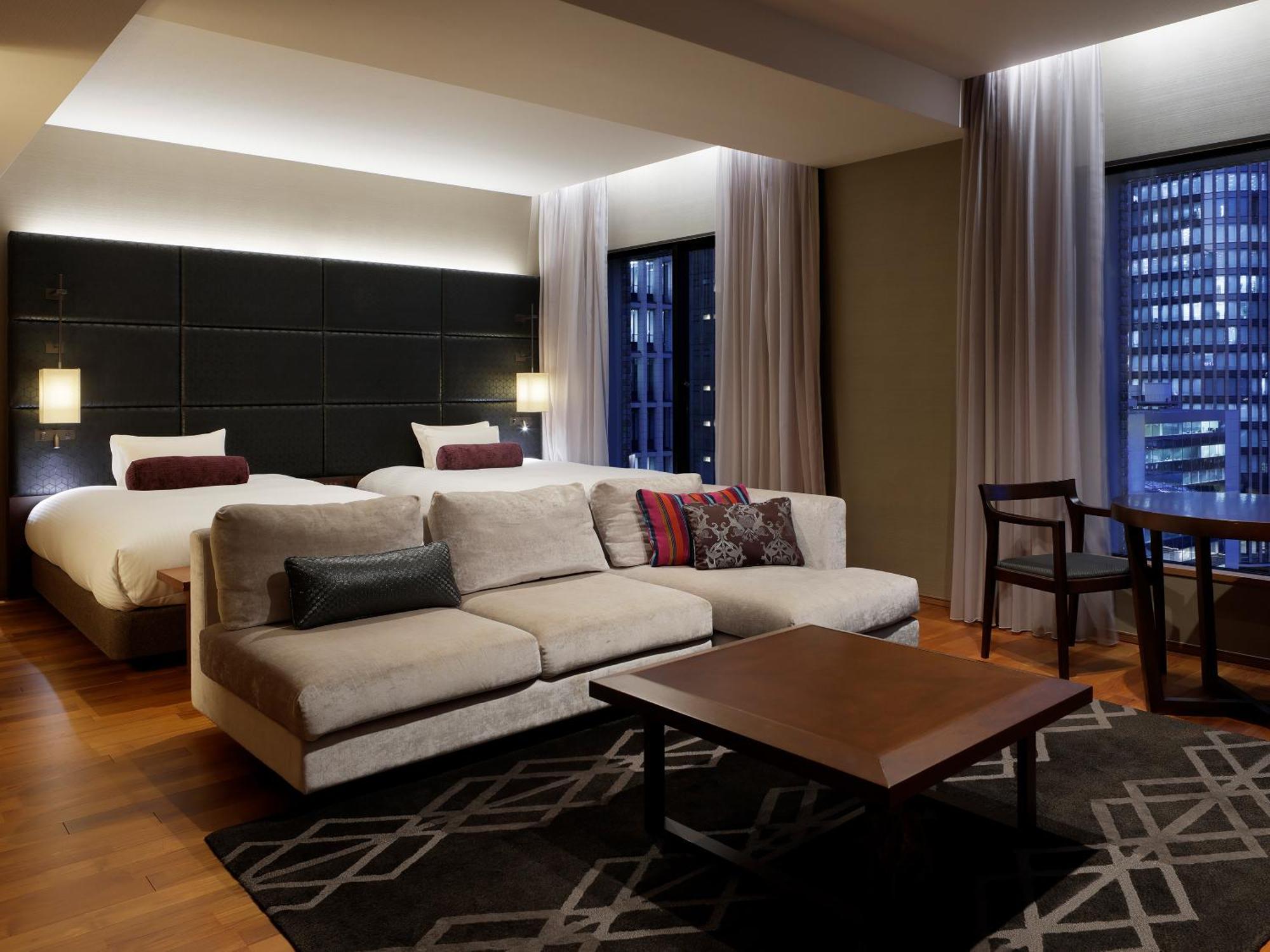 ​Tweepersoons Junior-suite met 2 aparte bedden en toegang tot de lounge - rookvrij