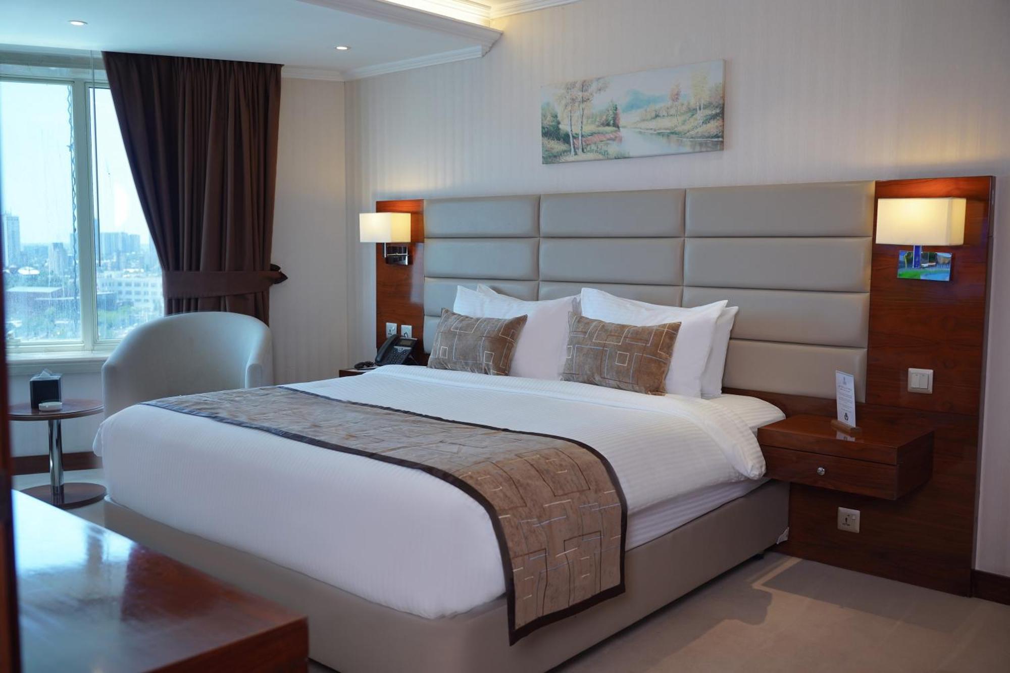 Deluxe Zimmer mit Kingsize-Bett