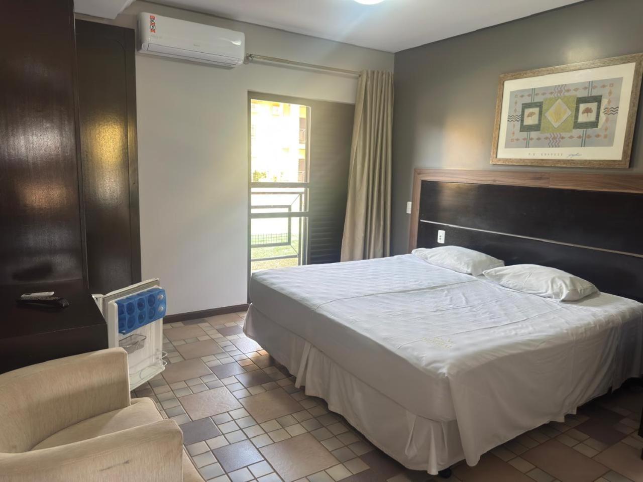 Quarto Deluxe (2 Adultos + 1 Criança)