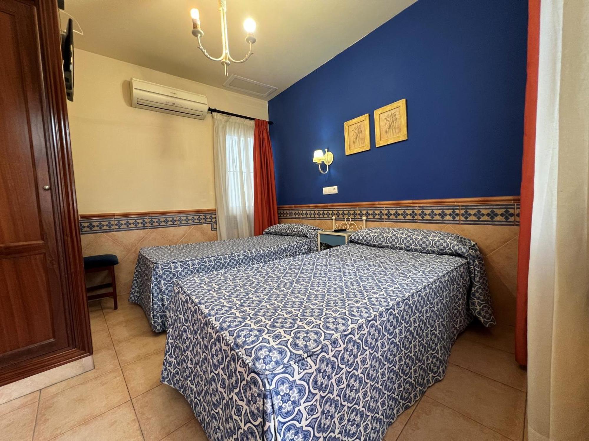 Quarto com 2 Camas de Solteiro