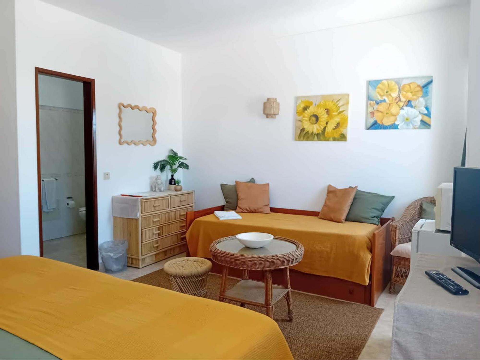 Quarto Triplo com Vista Cidade